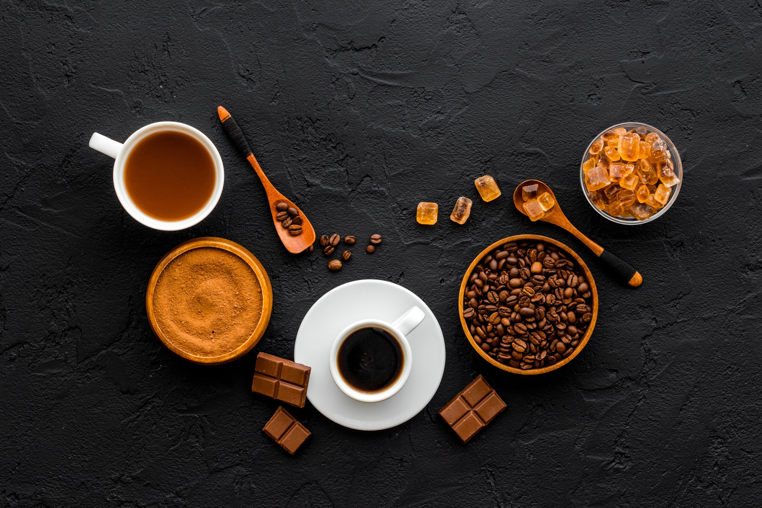 Background with assorted coffee and cocoa - beans with 