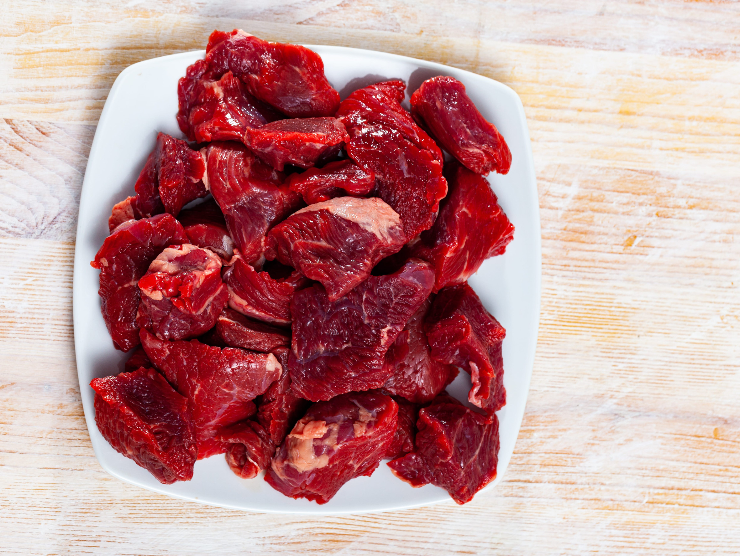 Raw beef prepared for stewing