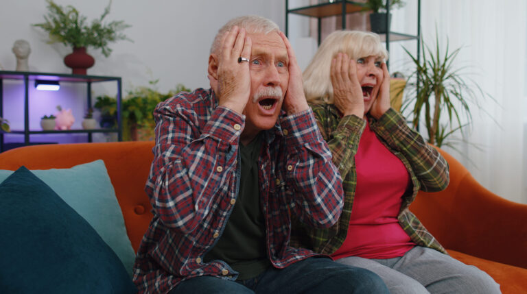 Excited amazed senior elderly family