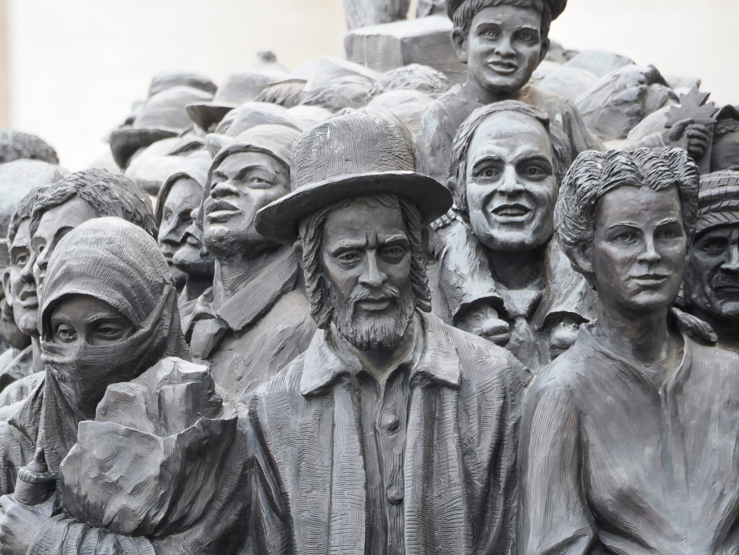 ROME, ITALY - NOVEMBER 25, 2022 : monument in tribute to migrants by Canadian artist-sculptor Timothy Schmalz in St. Peter's Square in Rome