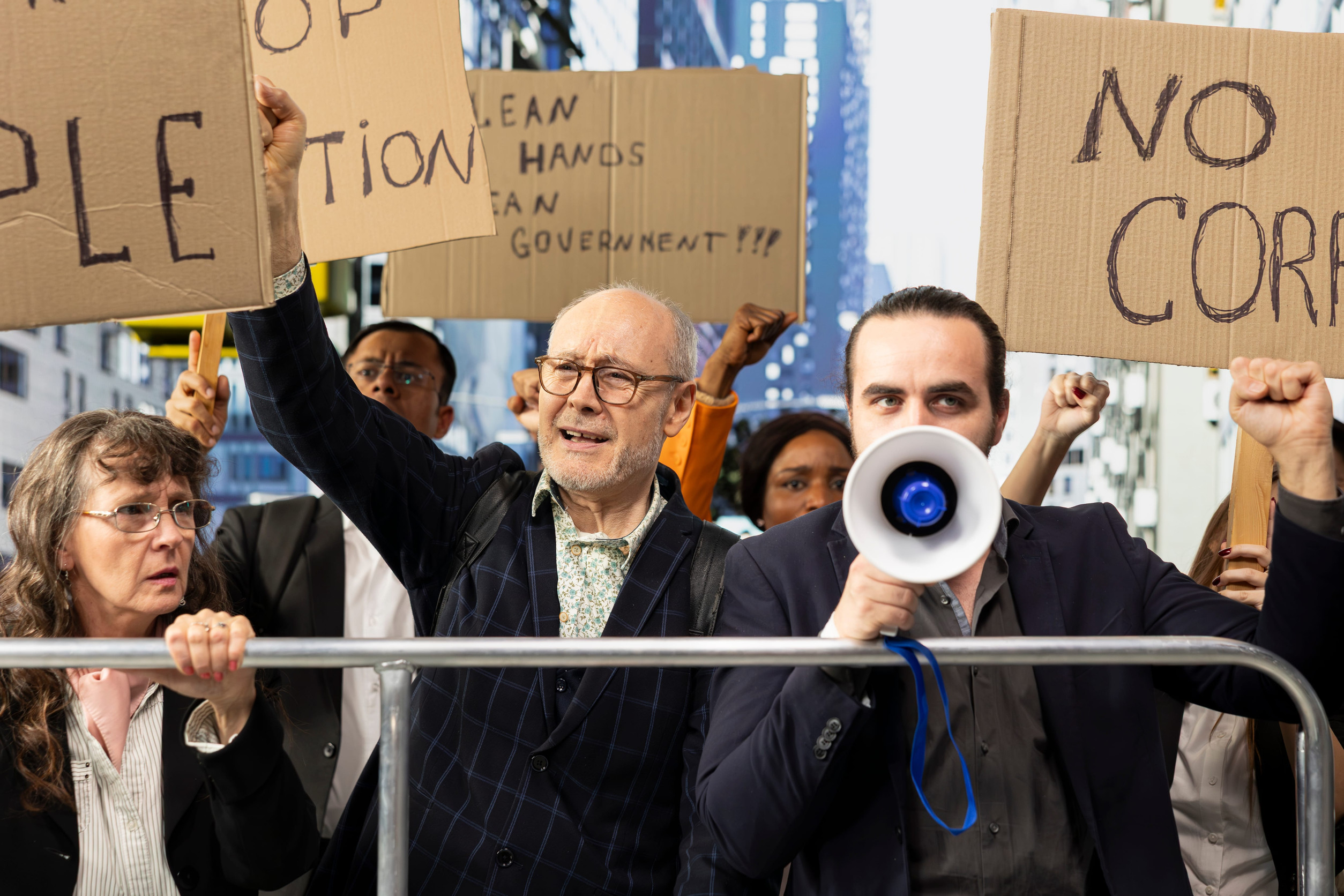 Public demonstration shows people united in activism against corruption, law misconduct and censorship, demanding democracy and equal rights. Non-violent protest and political action.