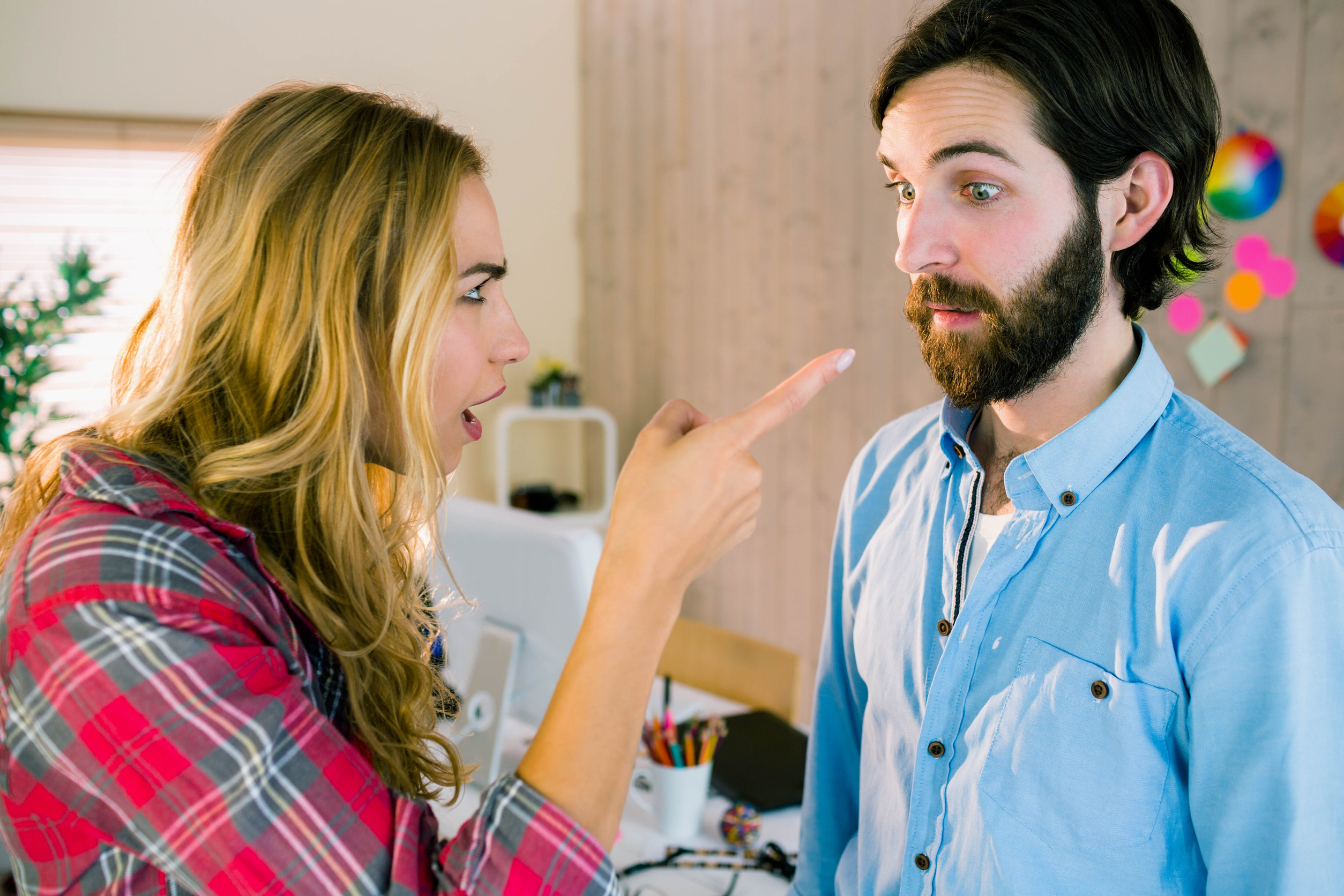 Creative team arguing in casual office