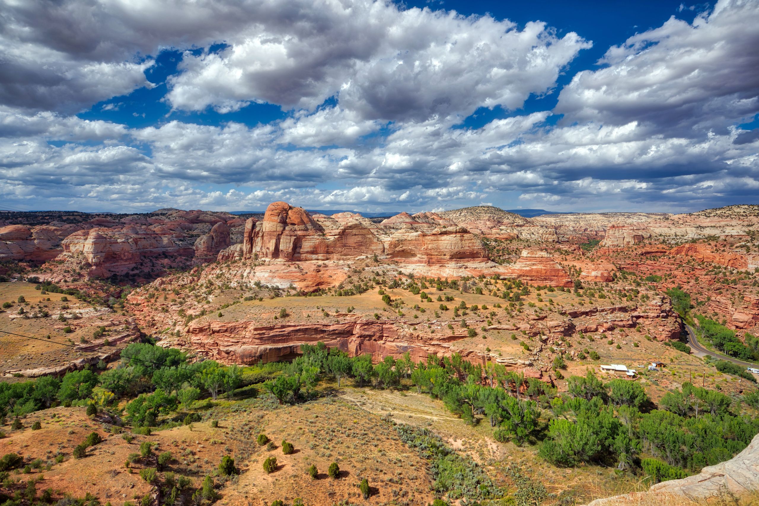 A stunning aerial view of the red rock formations in Utah's vibrant desert landscape.
