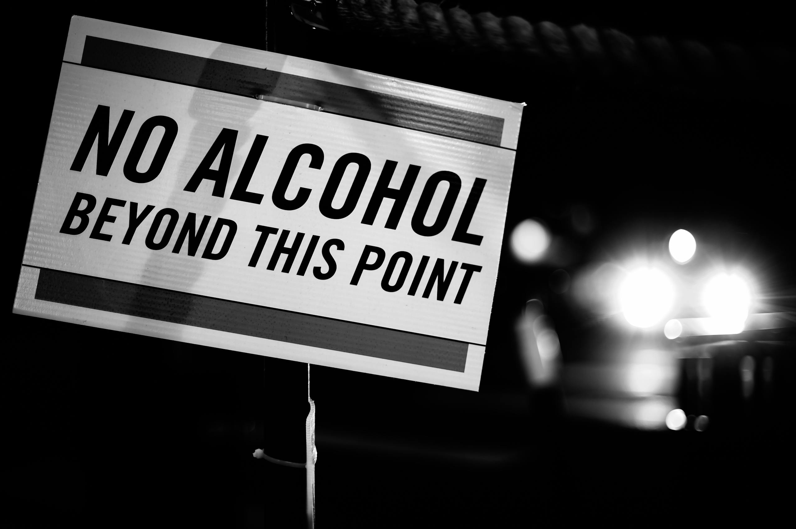 Black and white of forbidding inscription with words No Alcohol Beyond This Point