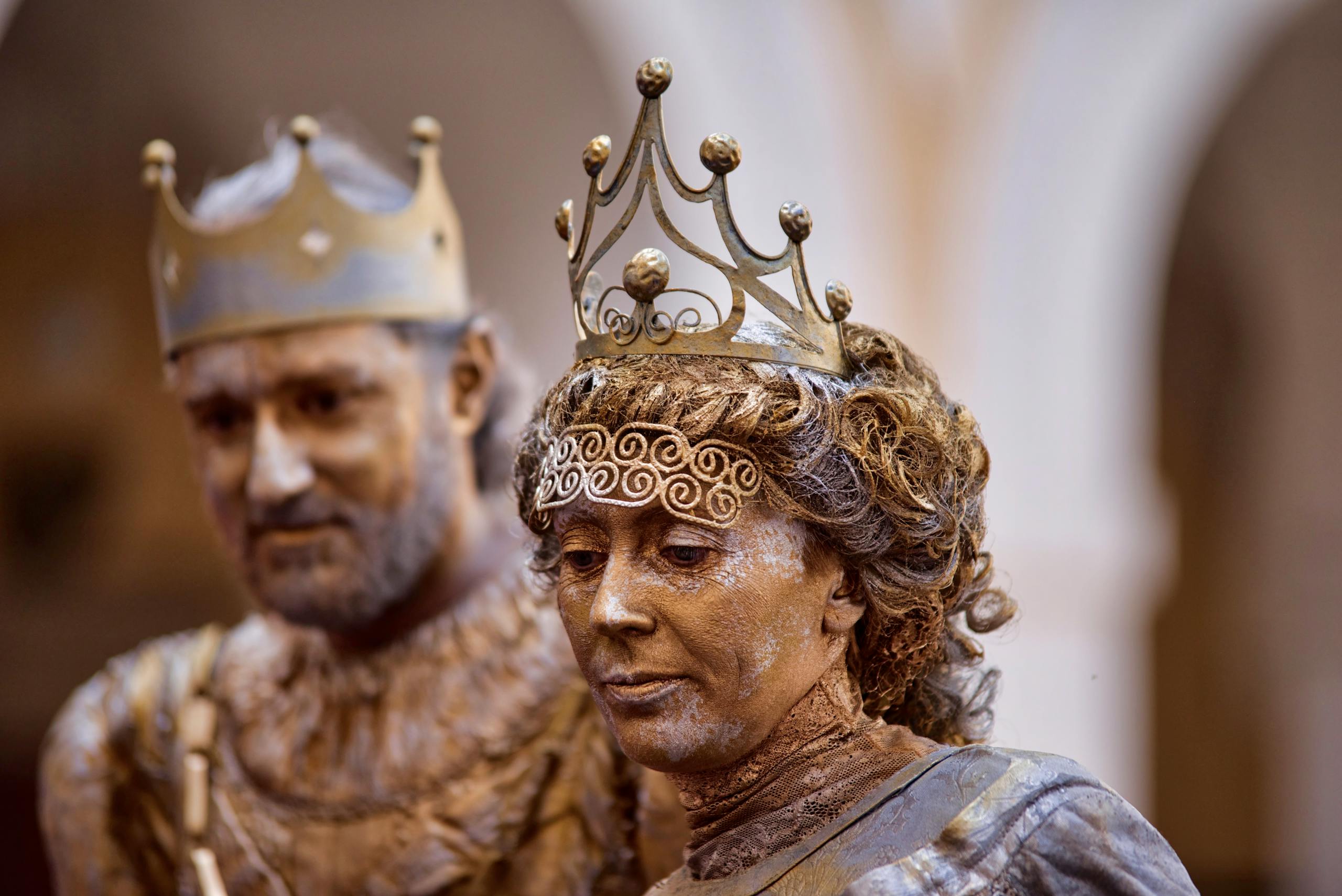 Close-up of actors in royal costumes and crowns at a medieval event in Kroměříž.