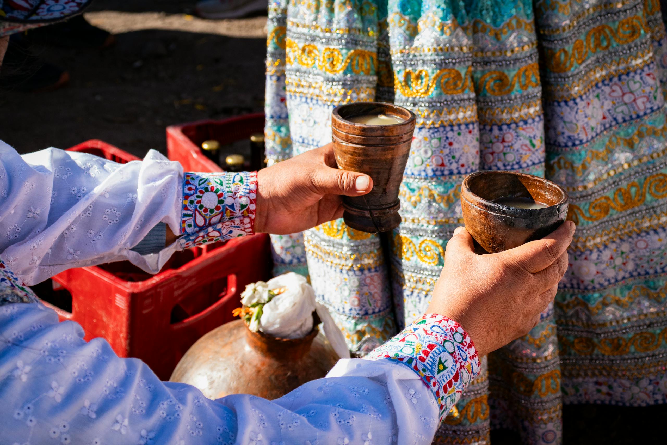 Colorful Peruvian tradition featuring chicha de jora served in Arequipa's vibrant festivities.