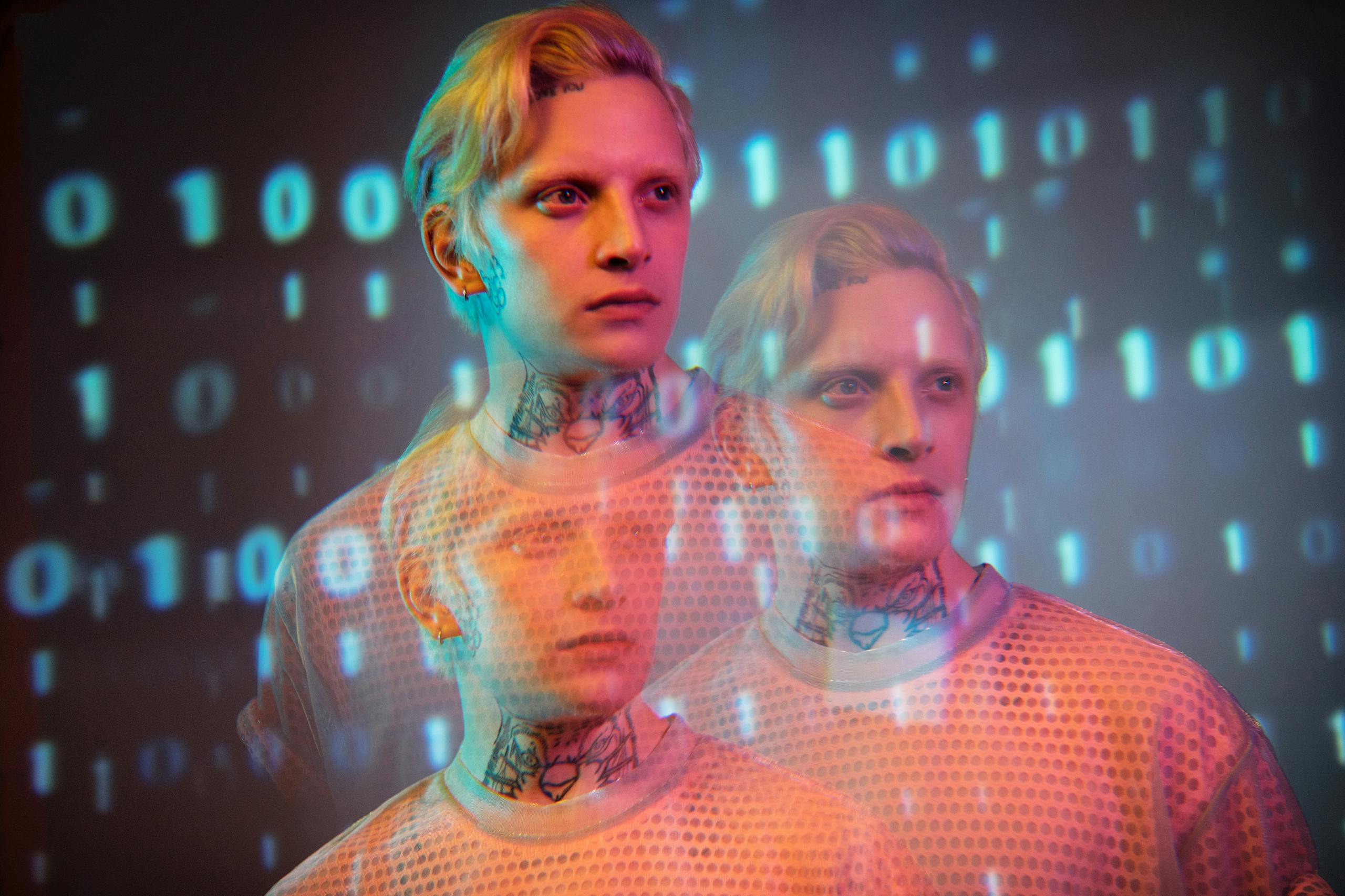 Creative portrait of a man with digital binary overlay, showcasing a modern artistic style.