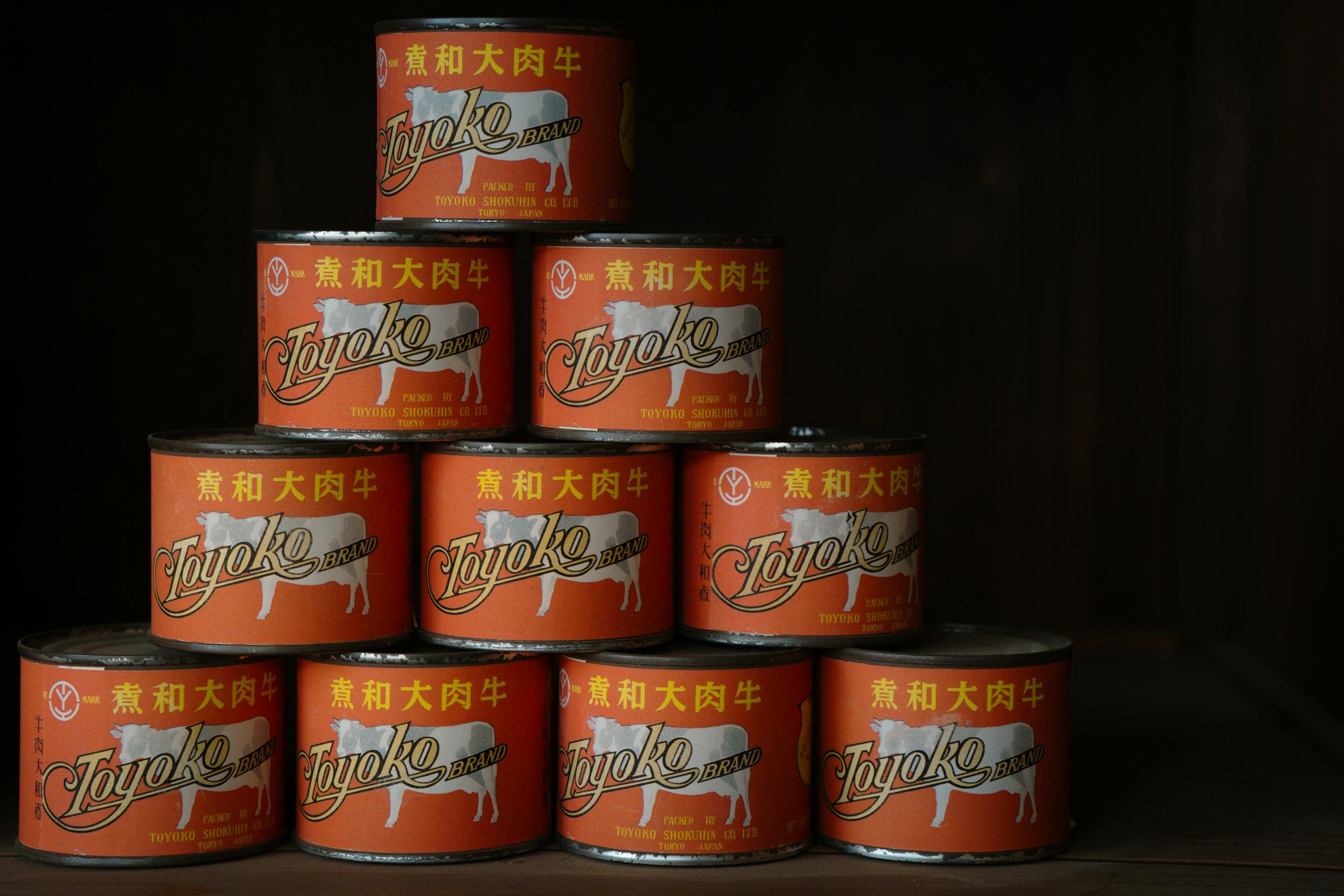 Image of stacked Toyoko Brand canned beef tins inside a store in Tokyo, Japan.