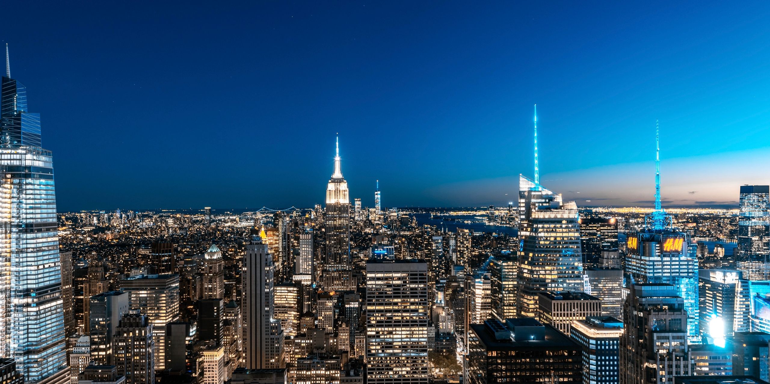 A breathtaking view of New York City's skyline illuminated at night.