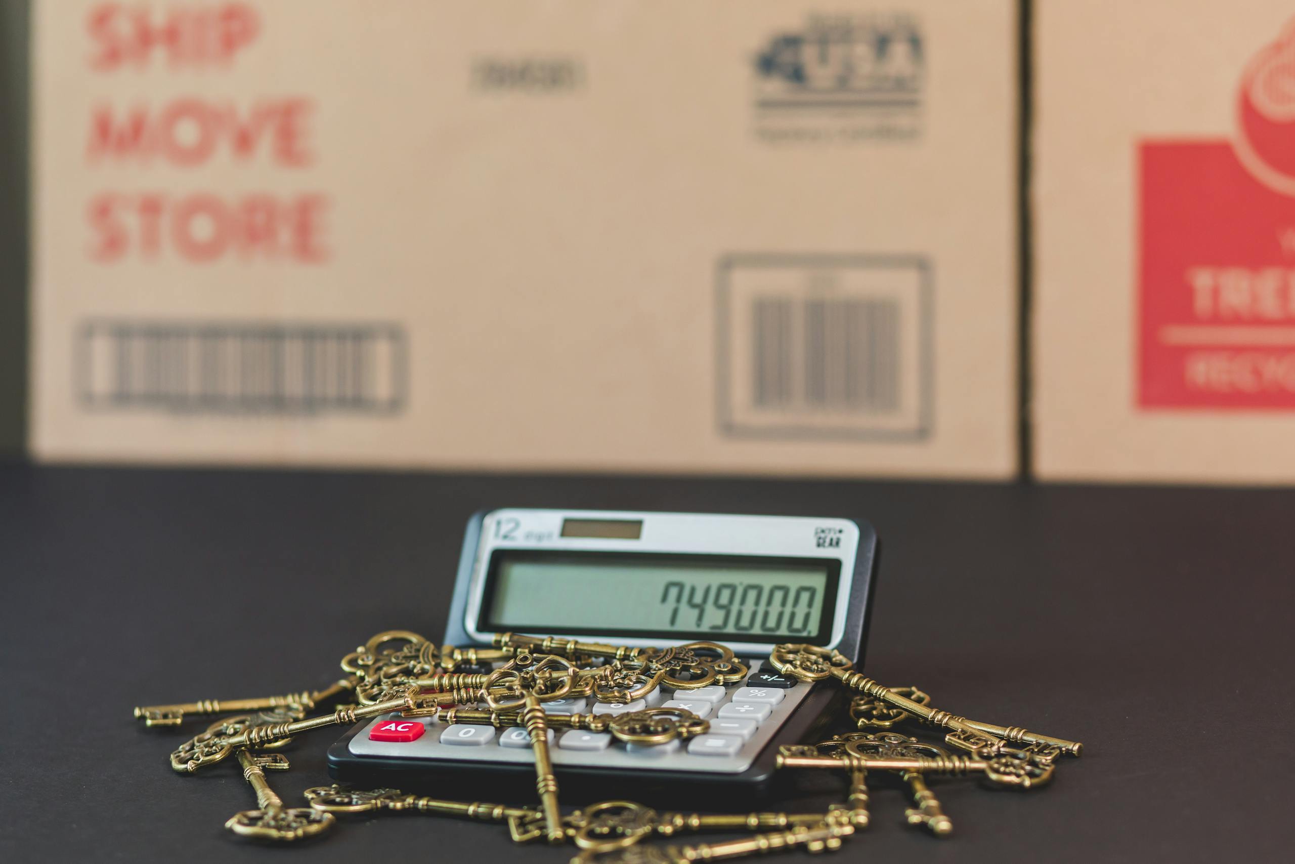 A calculator with vintage keys symbolizes real estate investment and mortgage calculations.