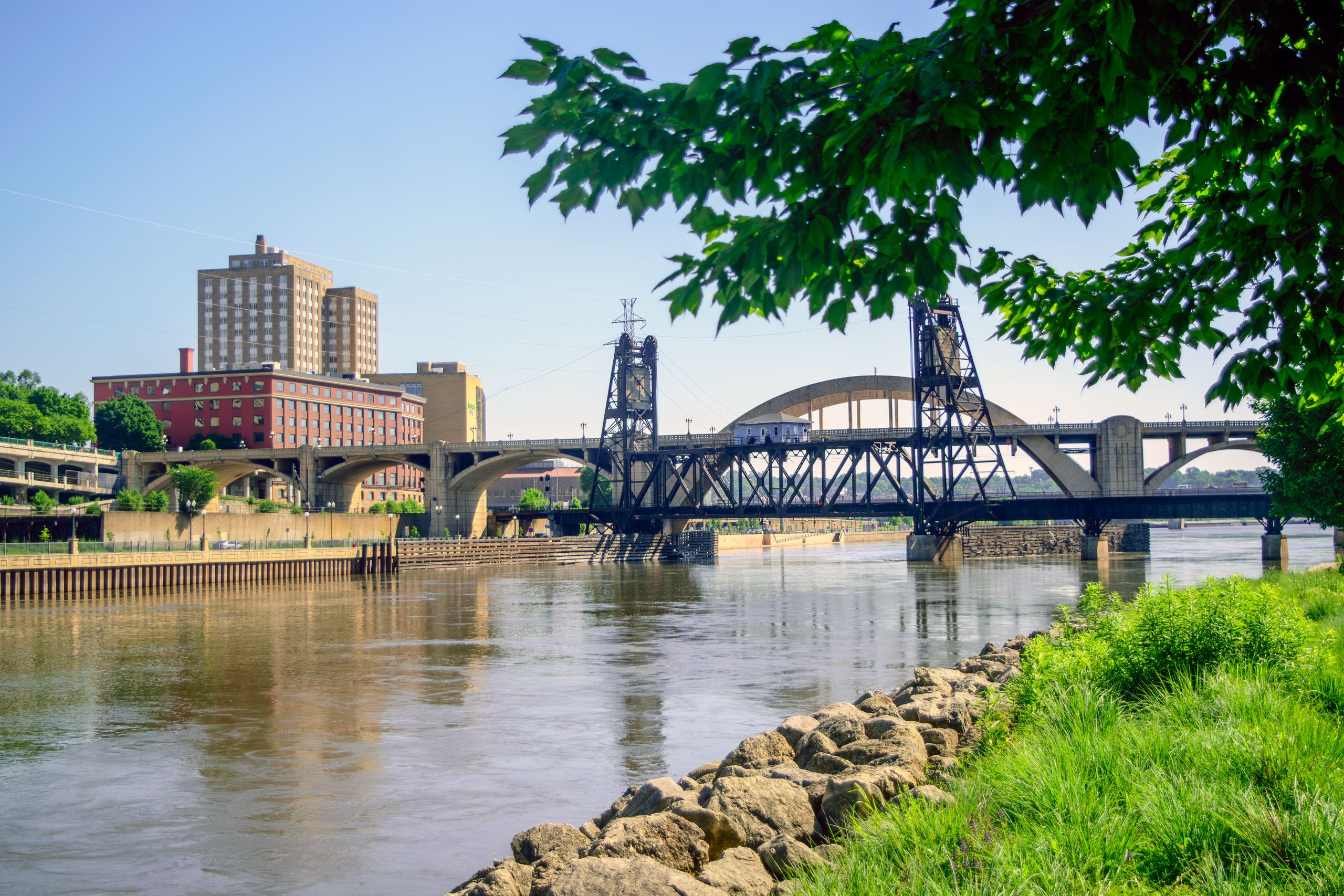 A scenic view of a train bridge over the Mississippi River in Saint Paul, Minnesota.