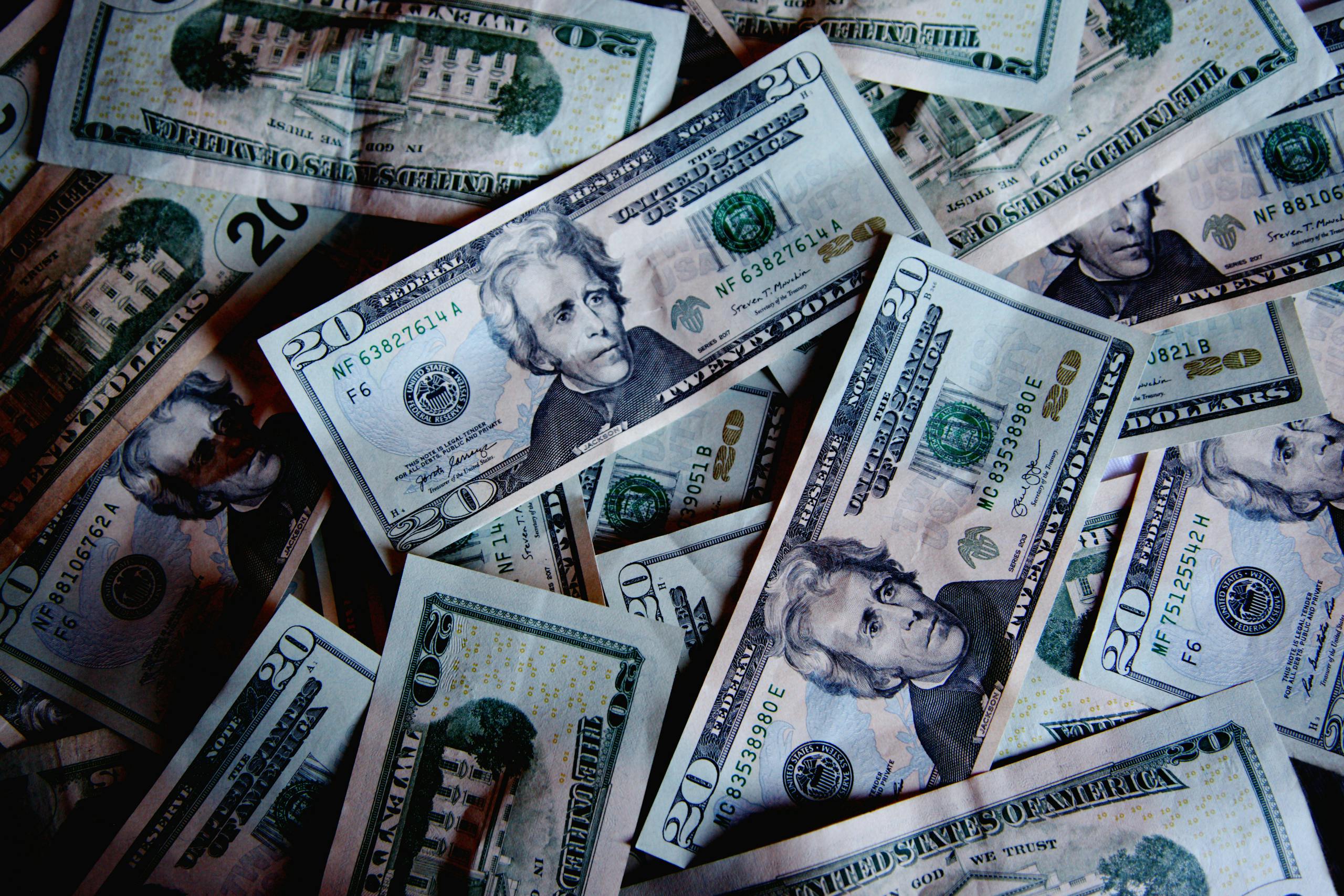 A stack of US dollar bills symbolizing wealth, finance, and abundance.