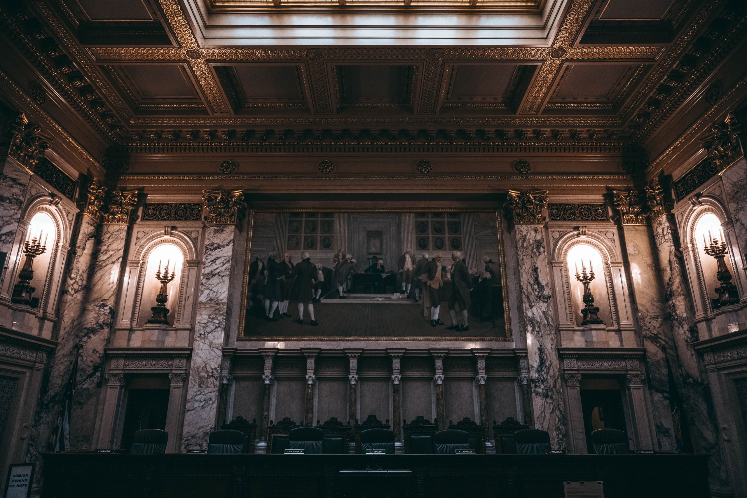 Baroque architecture inside Wisconsin State Capitol in Madison, WI, featuring intricate design and historic artwork.