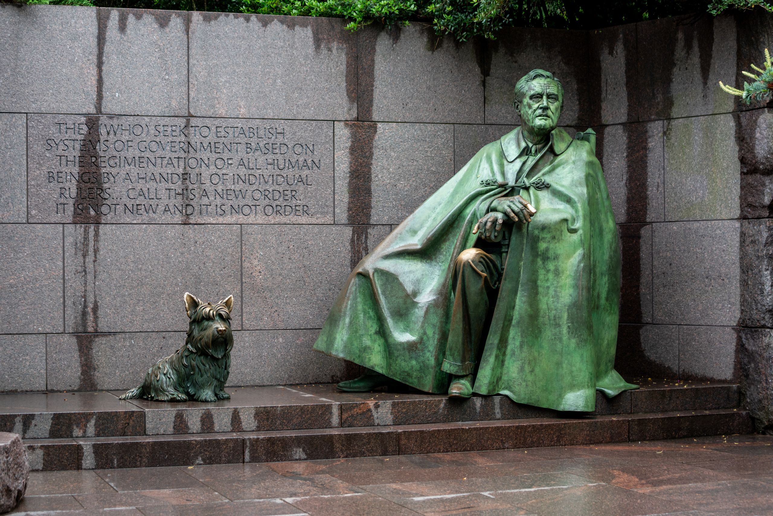 Bronze statue of Franklin D. Roosevelt with his dog at the memorial in Washington D.C.