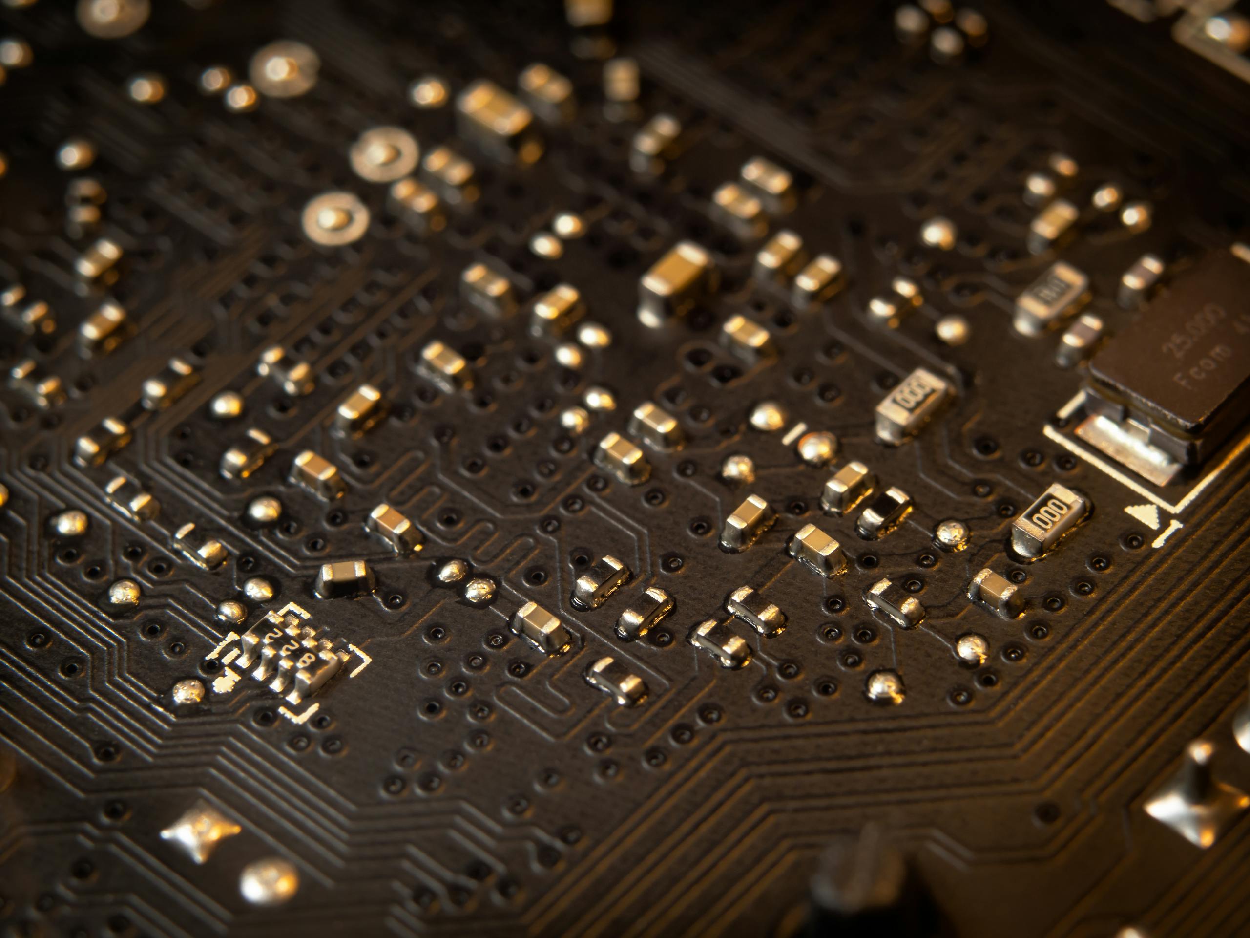 Detailed view of a circuit board showing various electronic components and traces.