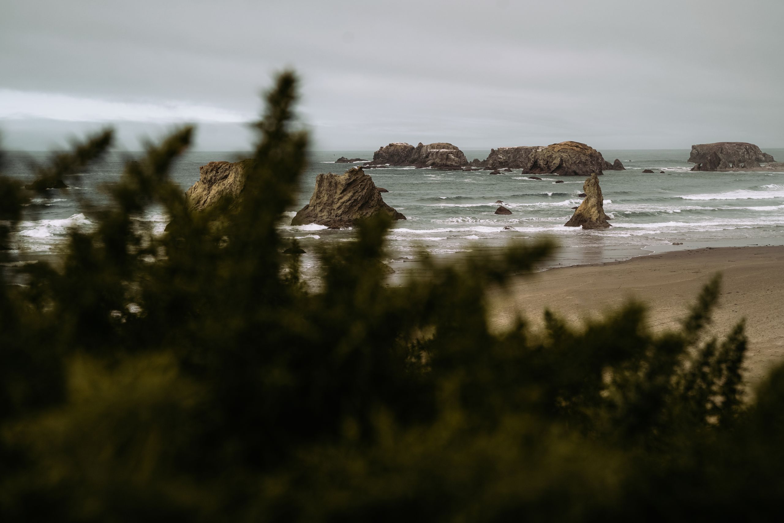 Experience the dramatic rock formations and serene ocean views at Bandon Beach, Oregon.