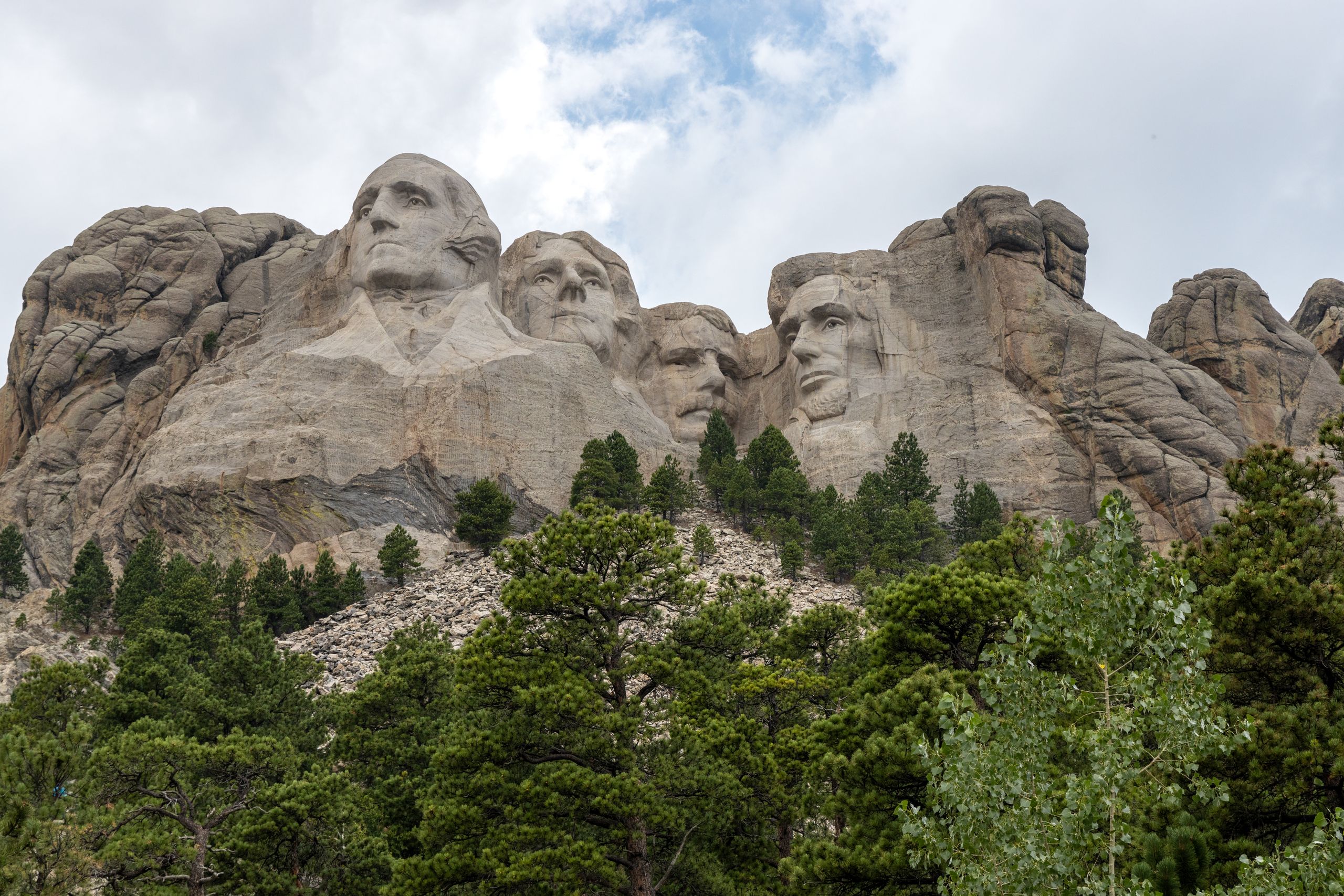 Explore the iconic Mount Rushmore with its monumental sculptures of four American presidents.