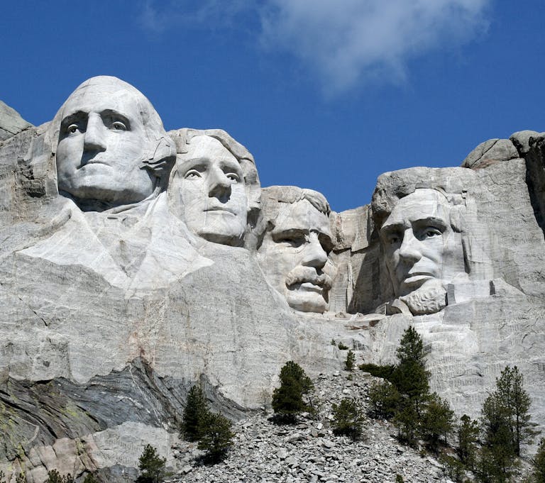 Famous Mount Rushmore sculptures depicting four US presidents in South Dakota.