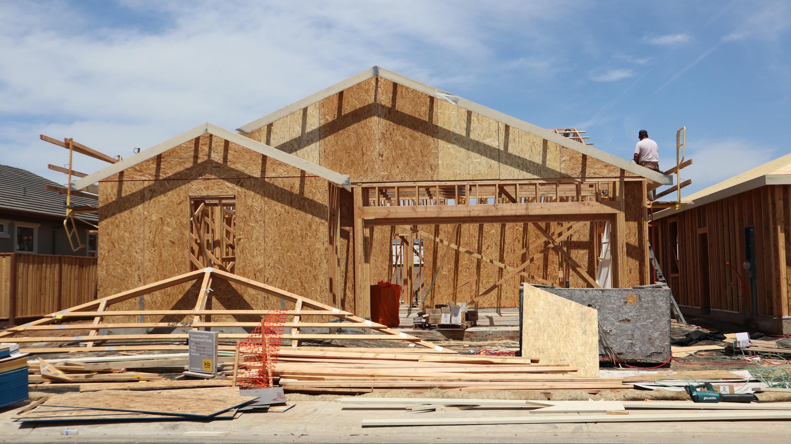 Framing stage of a new home under construction in Elk Grove, California.