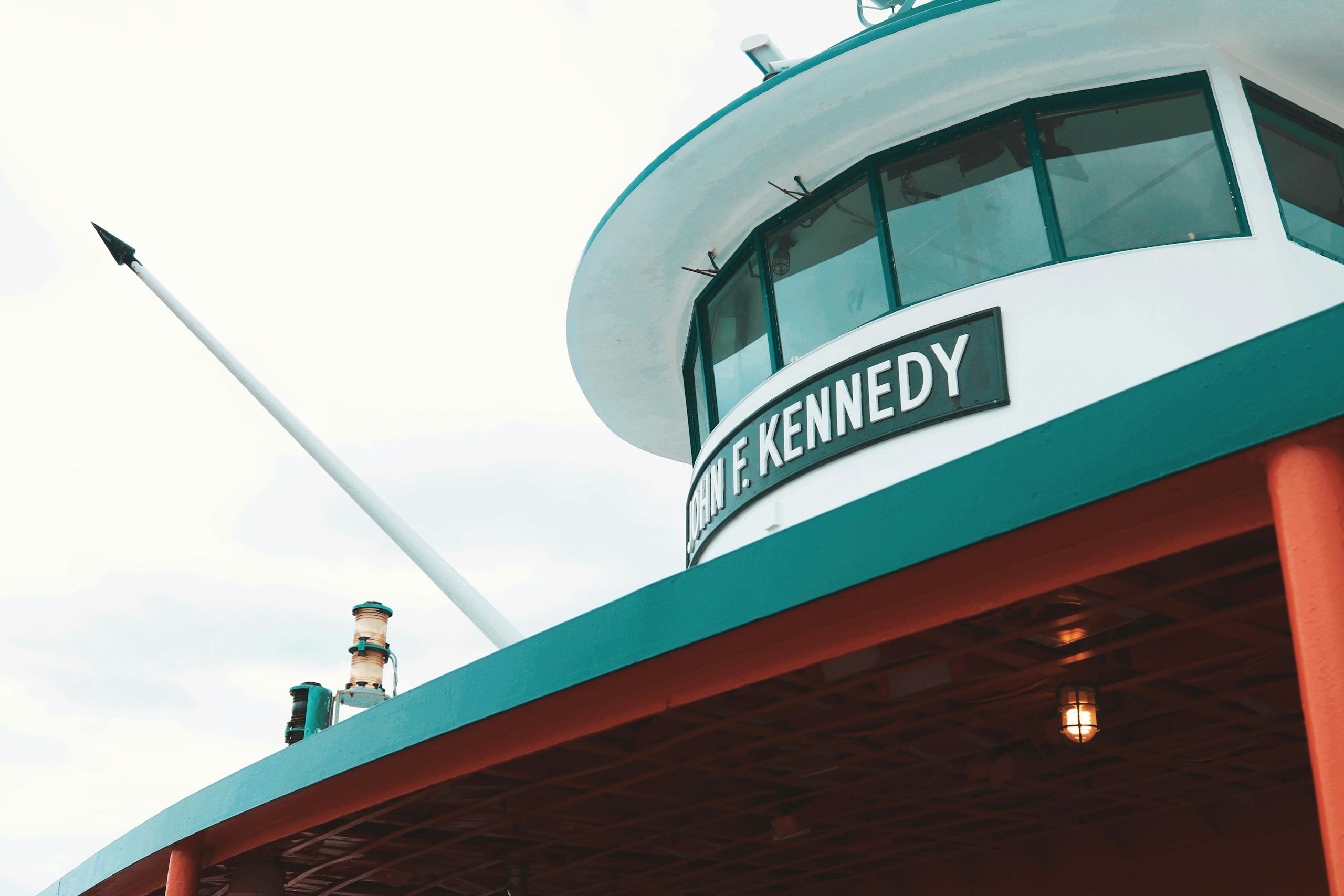 Low angle view of John F. Kennedy ferry exterior on a cloudy day, New York City.