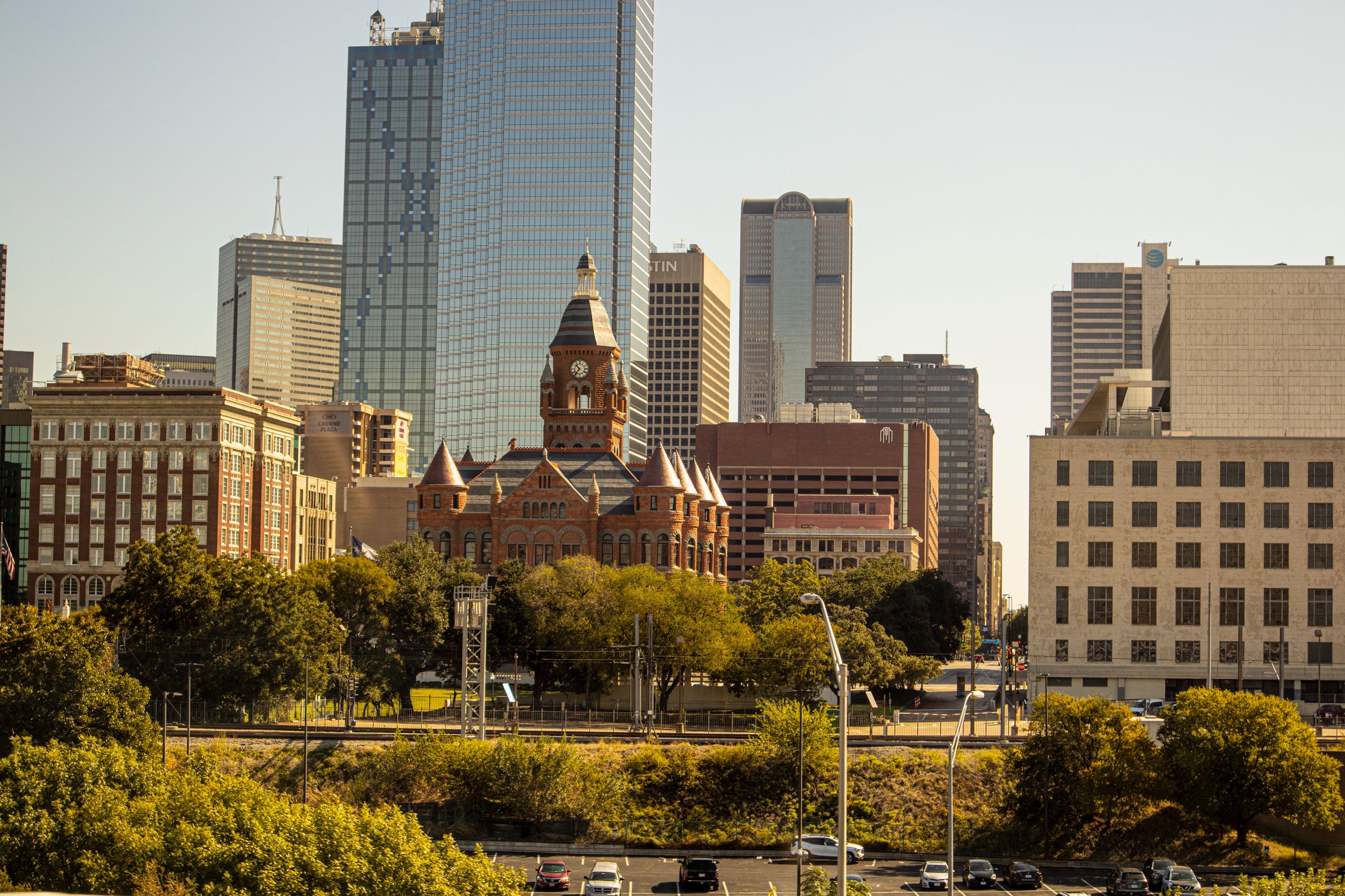 Scenic view of Dallas skyline featuring the Old Red Museum and skyscrapers.