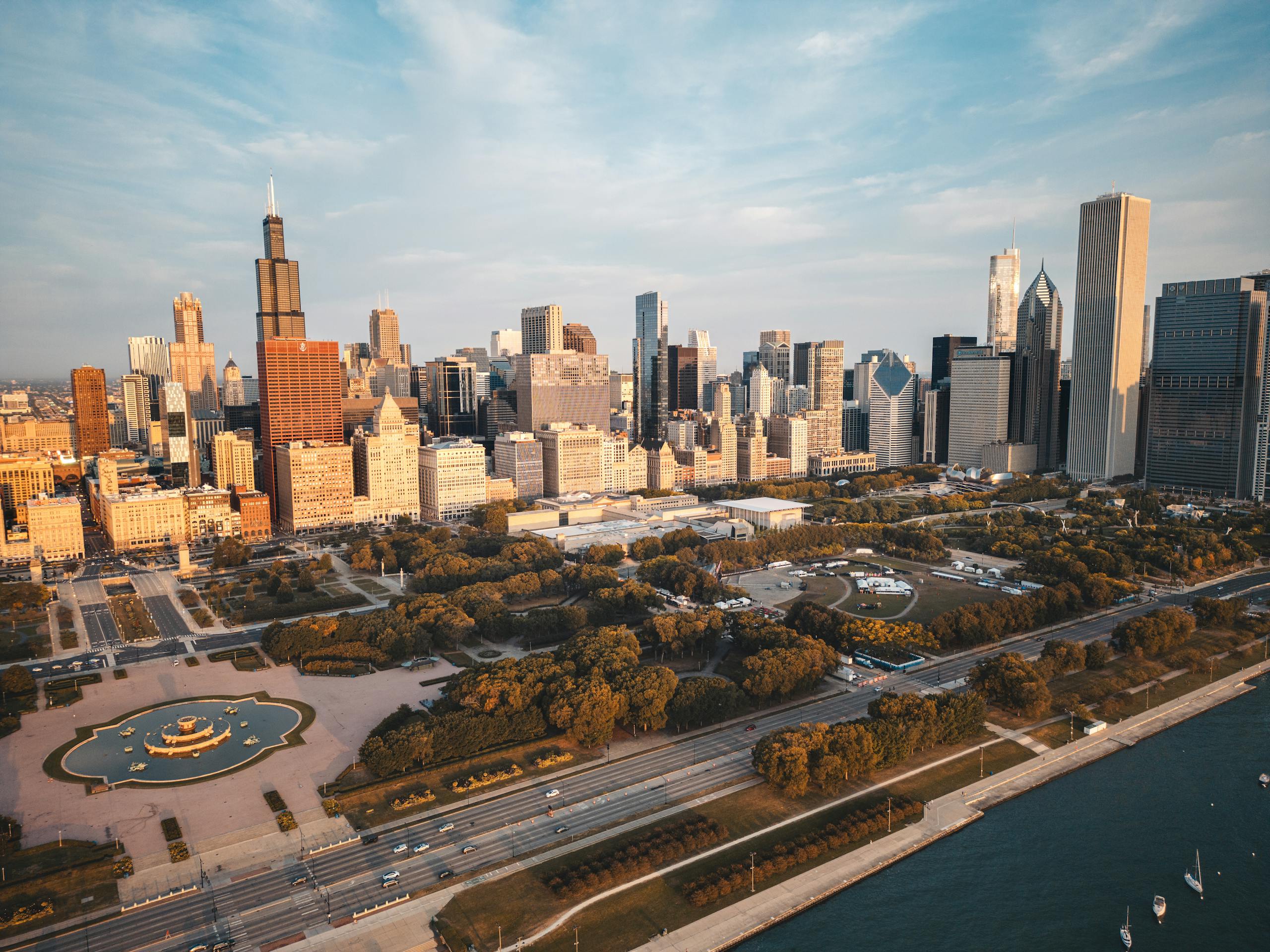 Stunning aerial view of the Chicago skyline with urban landscape and waterfront at dusk.