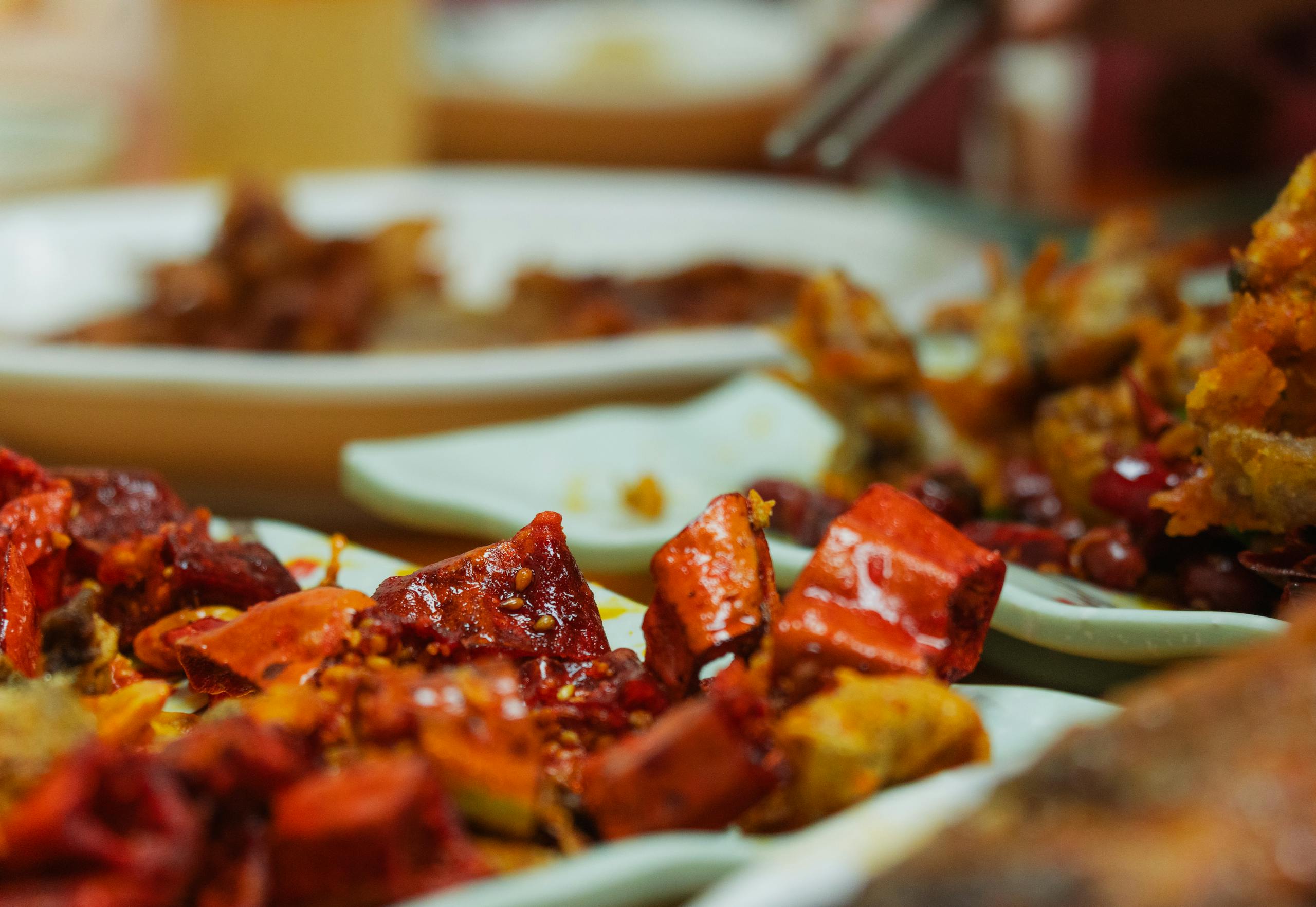 Vibrant and spicy Asian dishes featuring chili peppers, perfect for culinary enthusiasts.
