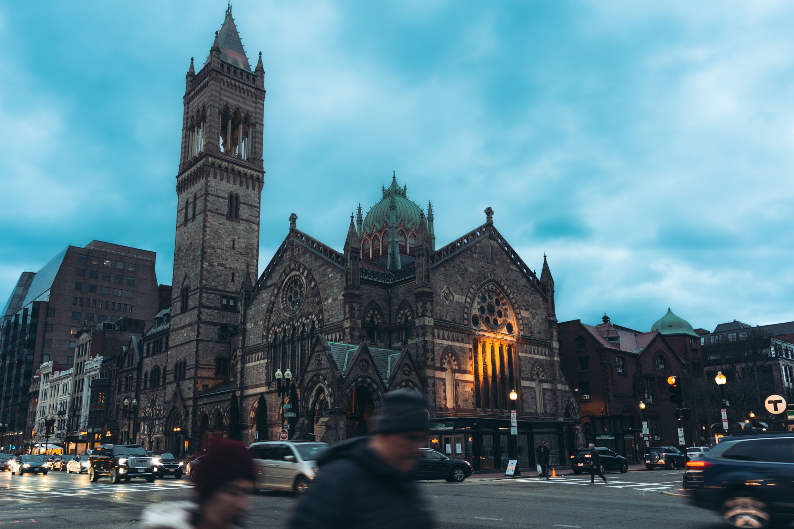 View of the iconic Old South Church with traffic at twilight in Boston, Massachusetts.
