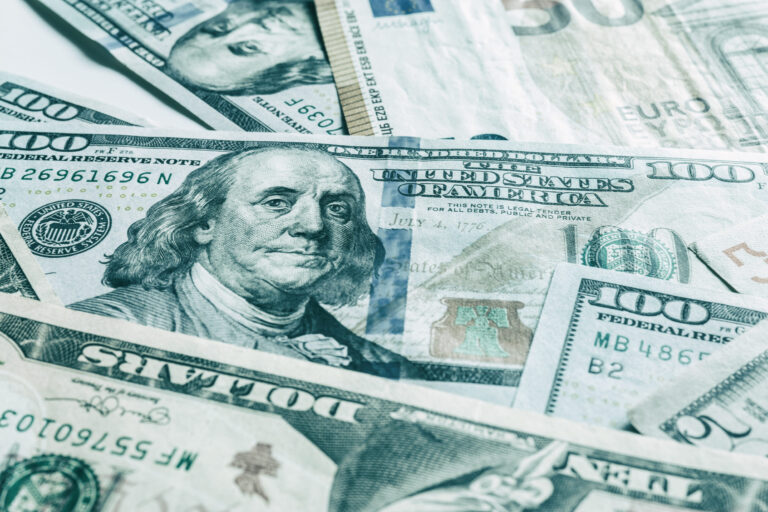 International currencies background. Money from different countries: dollars, euros. euro and dollar banknotes. money background. leading currencies. Selective focus. Close-up.