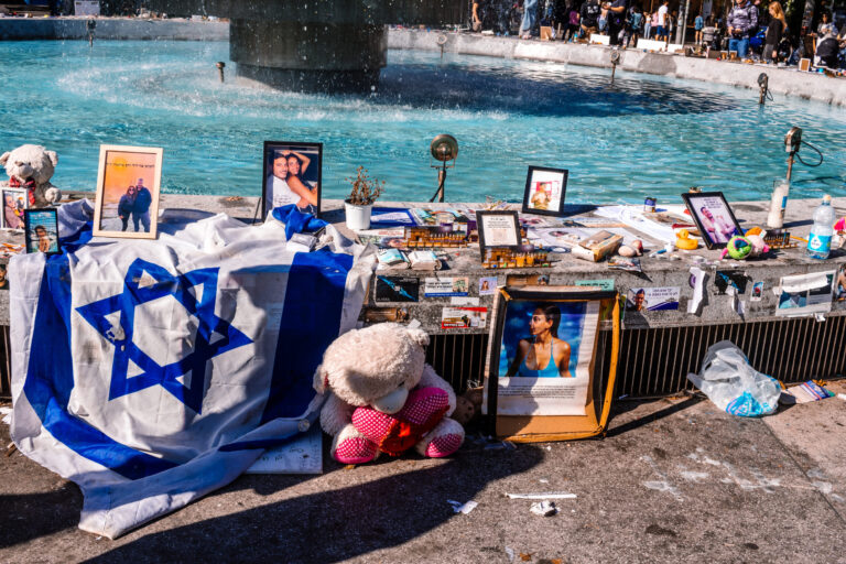 Tel Aviv, Israel - December 15, 2023. Dizengoff Square Memorial, Gifts and posters of the faces of hostages kidnapped by Hamas during the October 7, 2023 terrorist attack are on display.