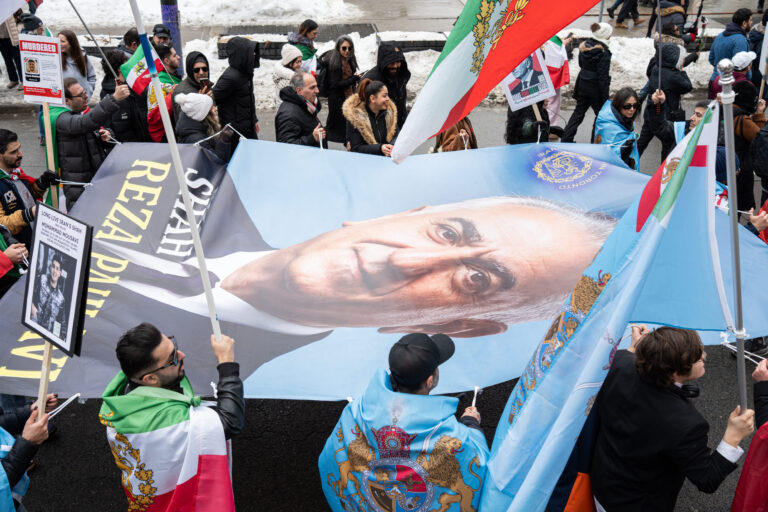Toronto, Ontario - February 14, 2026: Iranian diaspora rally with large Reza Pahlavi banner