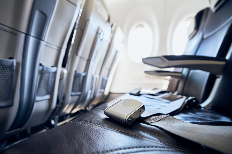 Empty seats in passenger cabin of commercial airplane.