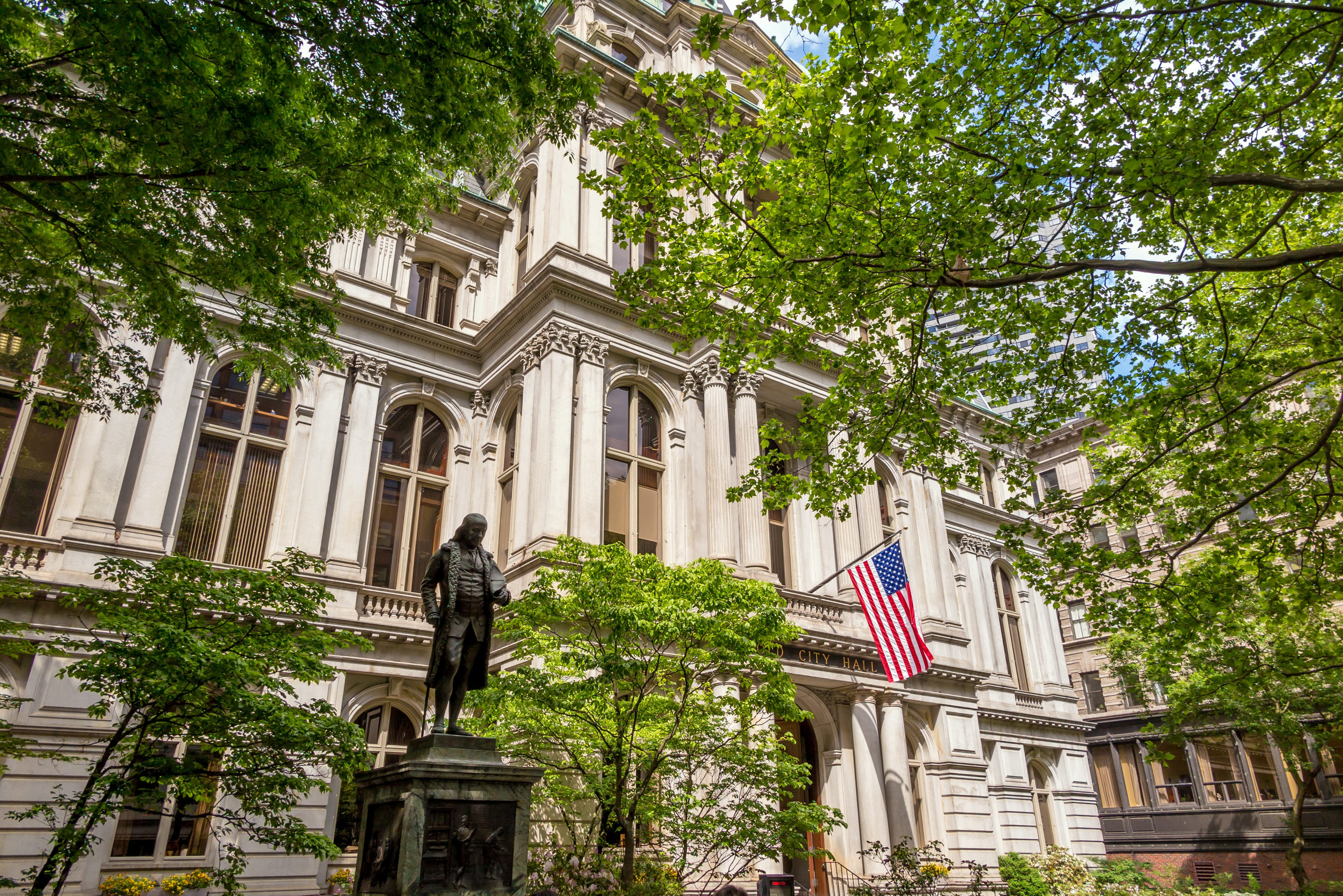 American flag on the Old City Hall building in Boston, Massachusetts, USA