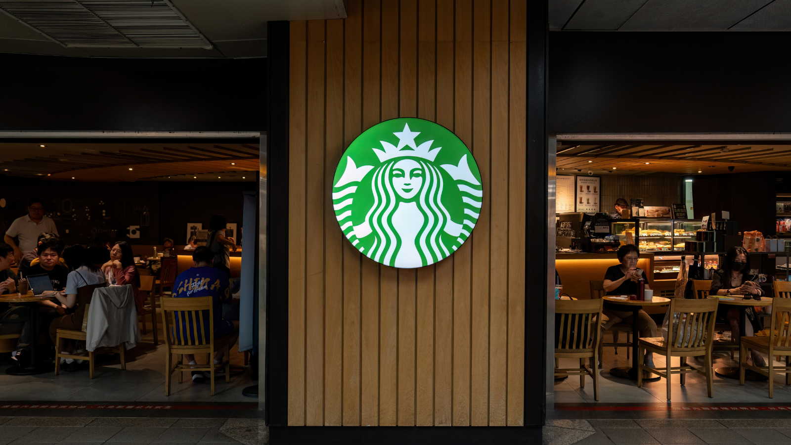 Starbucks coffee logo in front of the shop