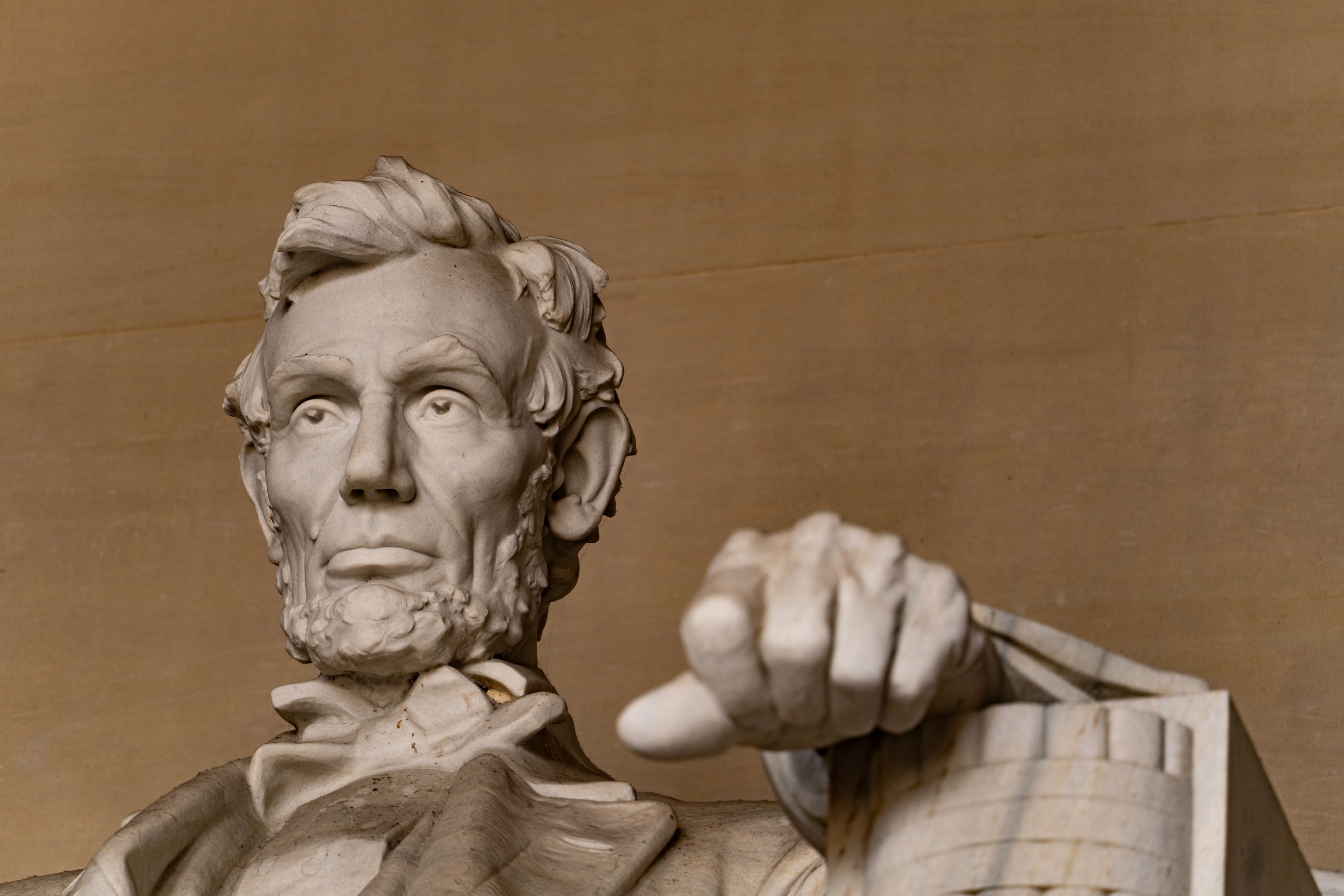 Detailed view of the Lincoln Memorial in Washington D.C., capturing the iconic statue's expression and posture.