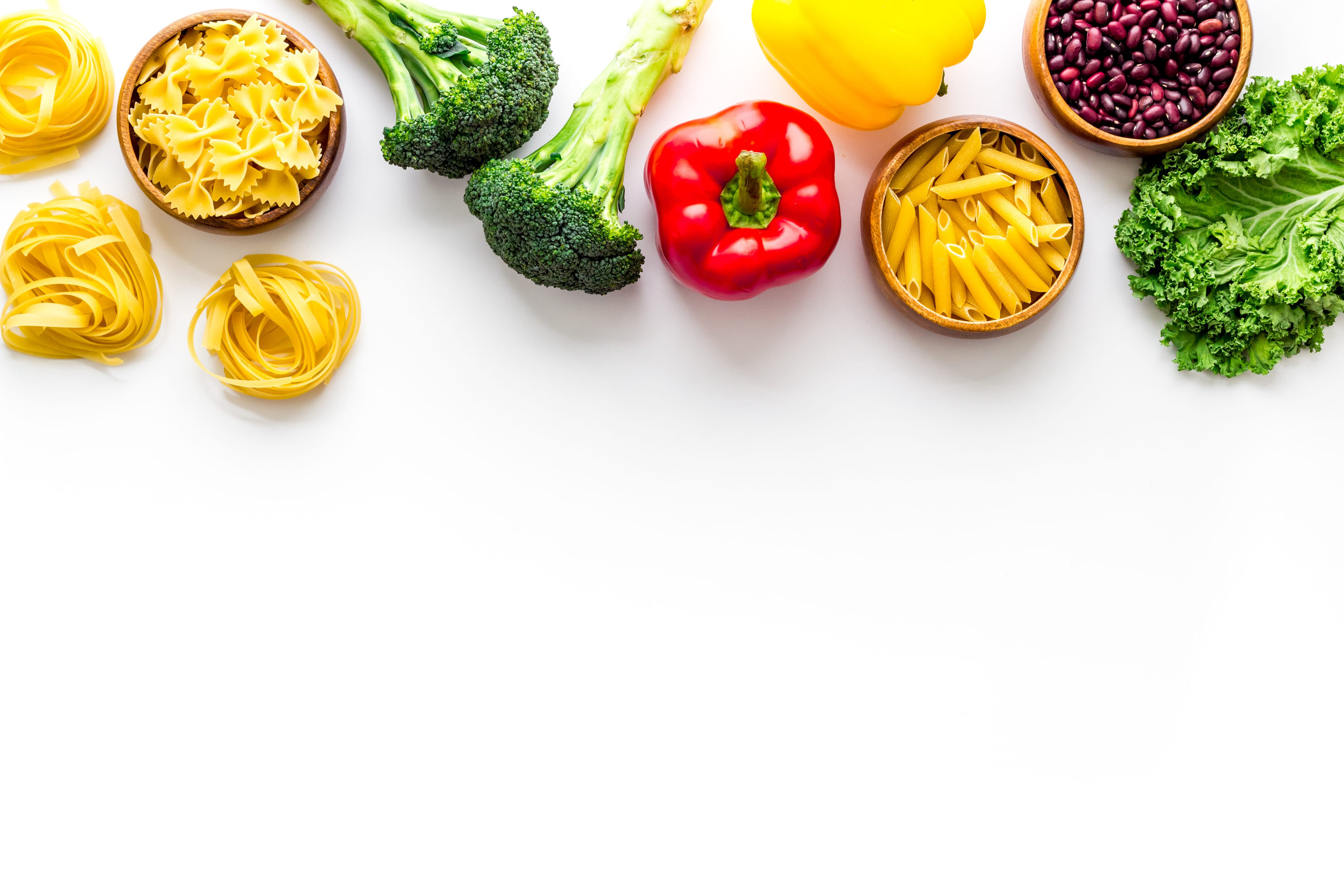Selection of healthy food - vegetables, beans and herbs. View from above