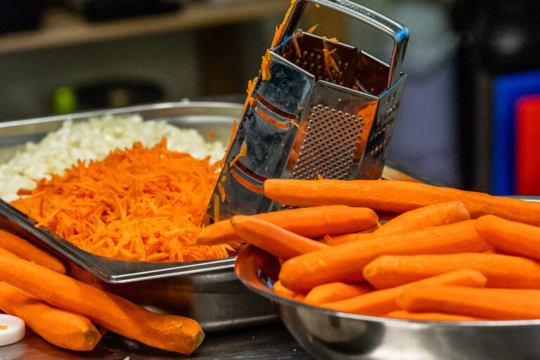 Pealed and Sliced Carrots in a Stainless Steel Bowl on Table. Image Credit: rnullemedia/ 123RF