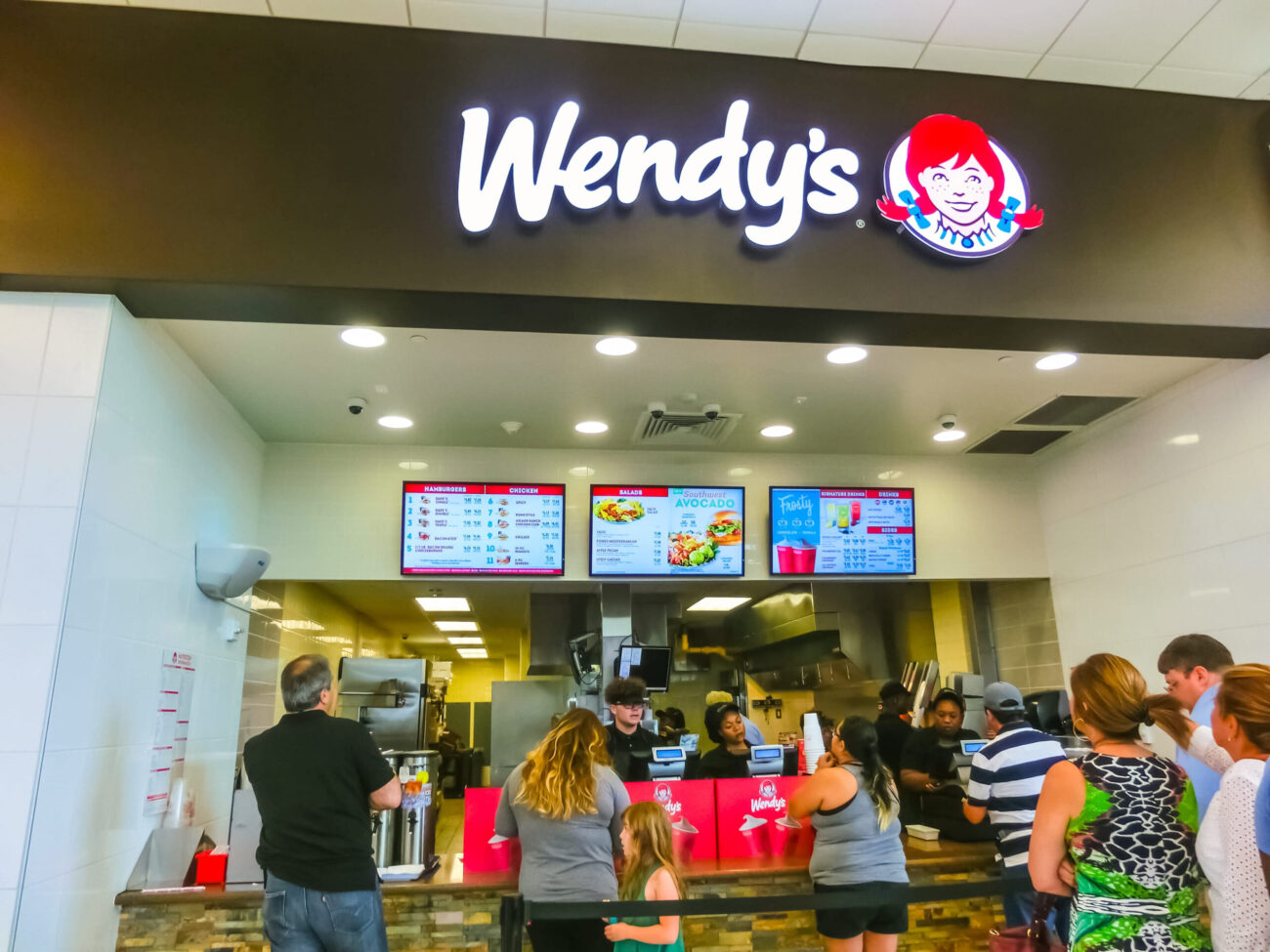 The people at famous hamburger shop WENDYS at Orlando, USA. Image Credit: marina113/ 123RF