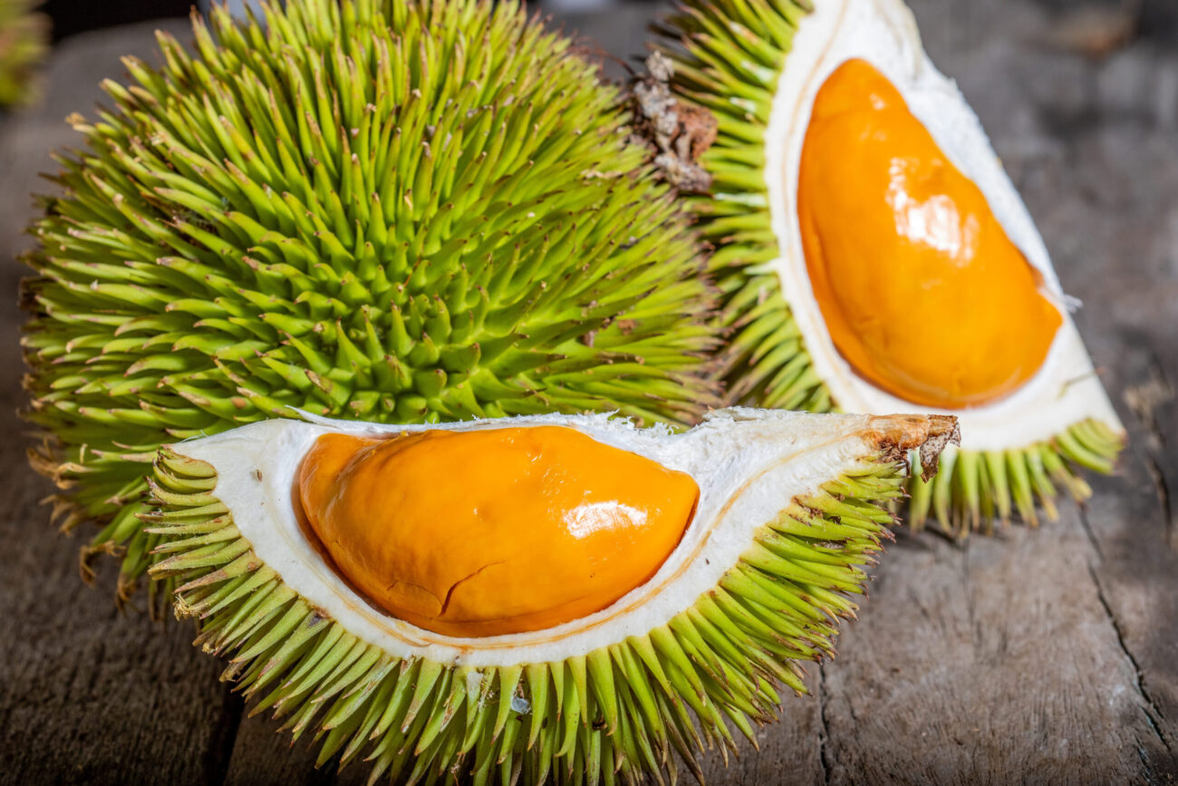 Durian fruit on a old wooden table. Image Credit: alexloi64/ 123RF