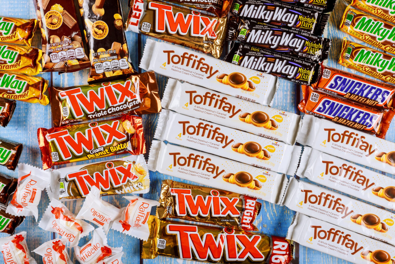 Chocolates assortment of chocolate sweets incorporated manufactured Toffifee, Milky way, Raffaello, snickers, Twix, Mars, hersheys. Image Credit: photovs/ 123RF
