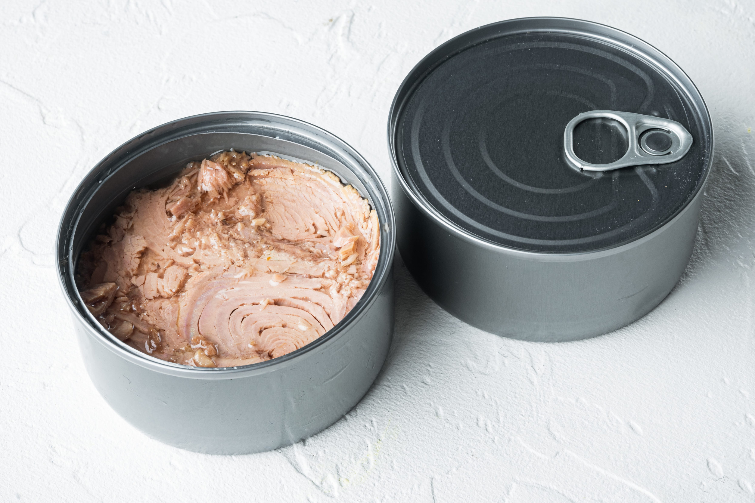 Canned italian tuna set, in tin can, on white background