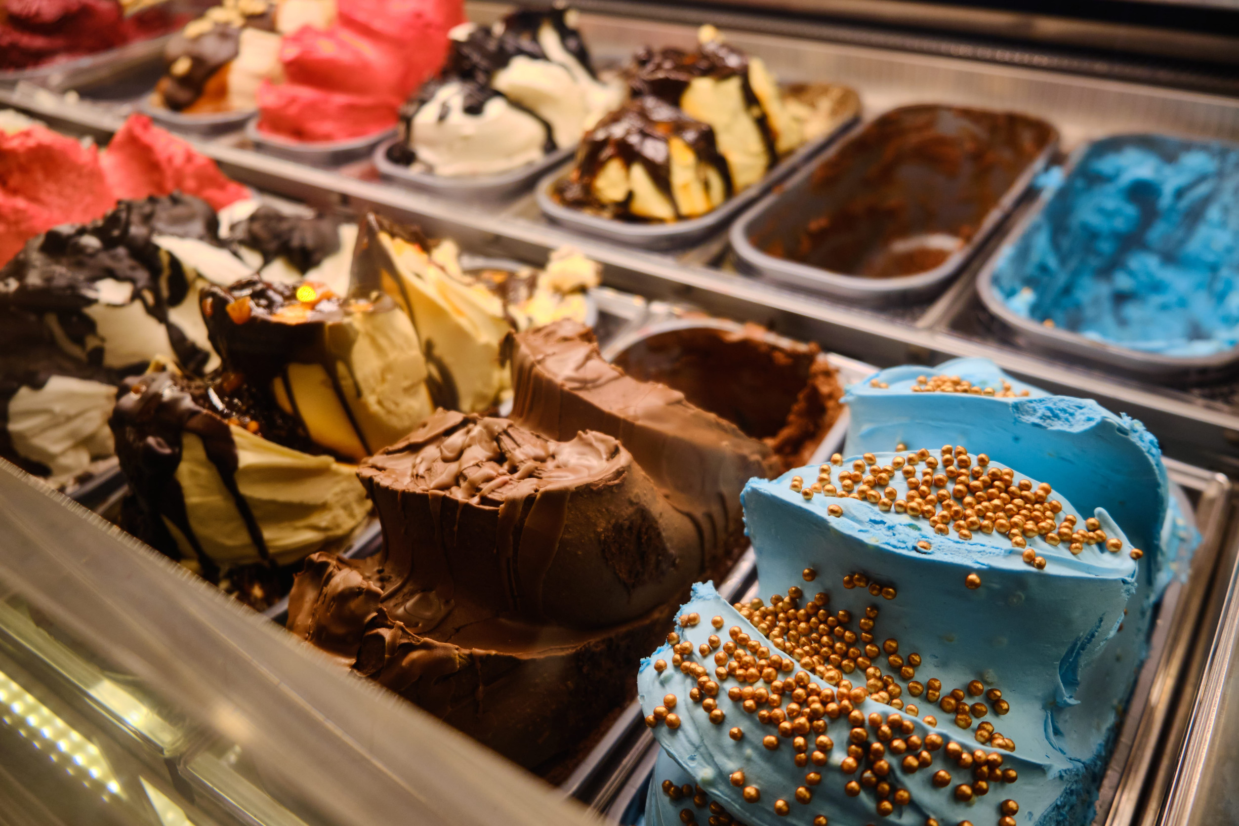 Lots of ice creams at showcase fridge display