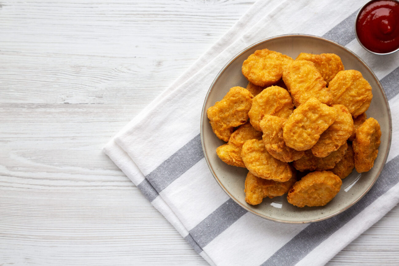 Homemade Chicken Nuggets with Ketchup, top view. Image Credit: liudmylachuhunova/ 123RF
