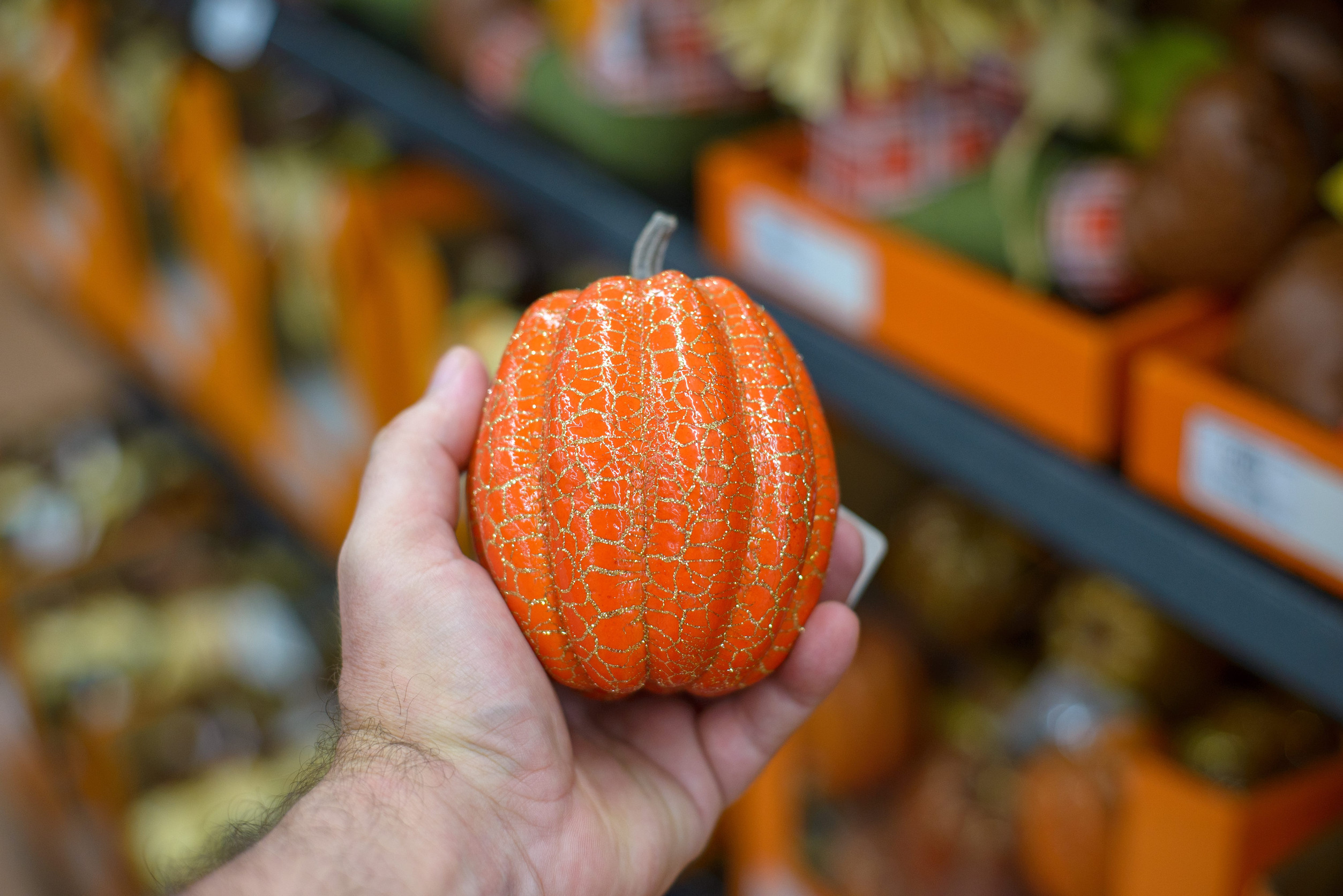 Plastic pumpkin. Sale of decorative objects of autumn season.