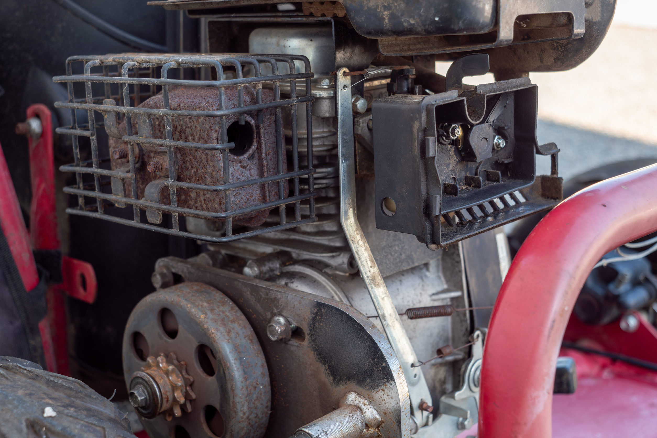 a close-up image of a rusty old engine
