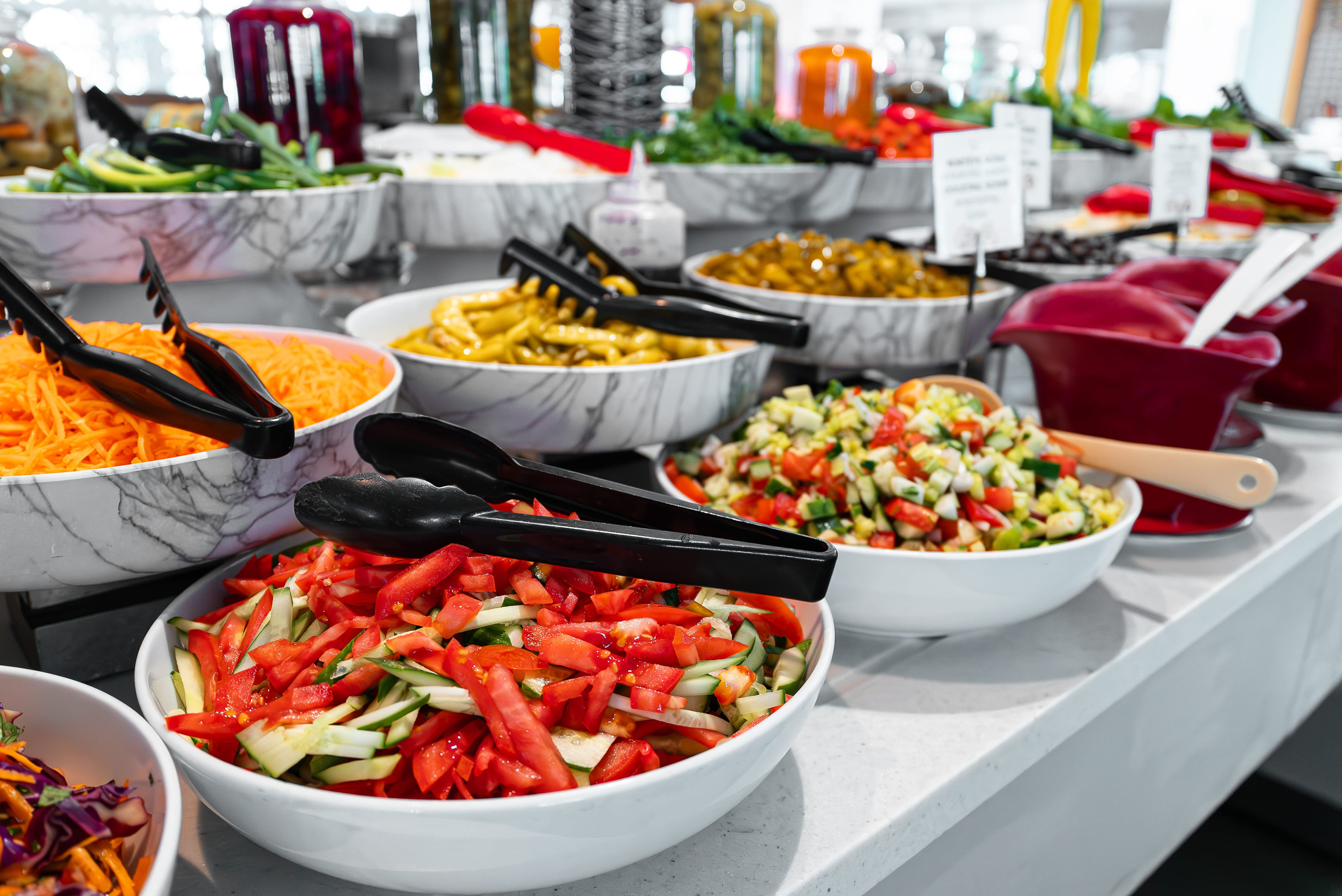 Chopped vegetables and vegetable salads. All-inclusive concept.