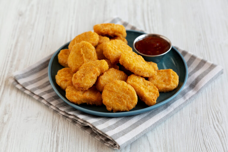 Chicken Nuggets with Sweet Chili Sauce on a Plate, side view.