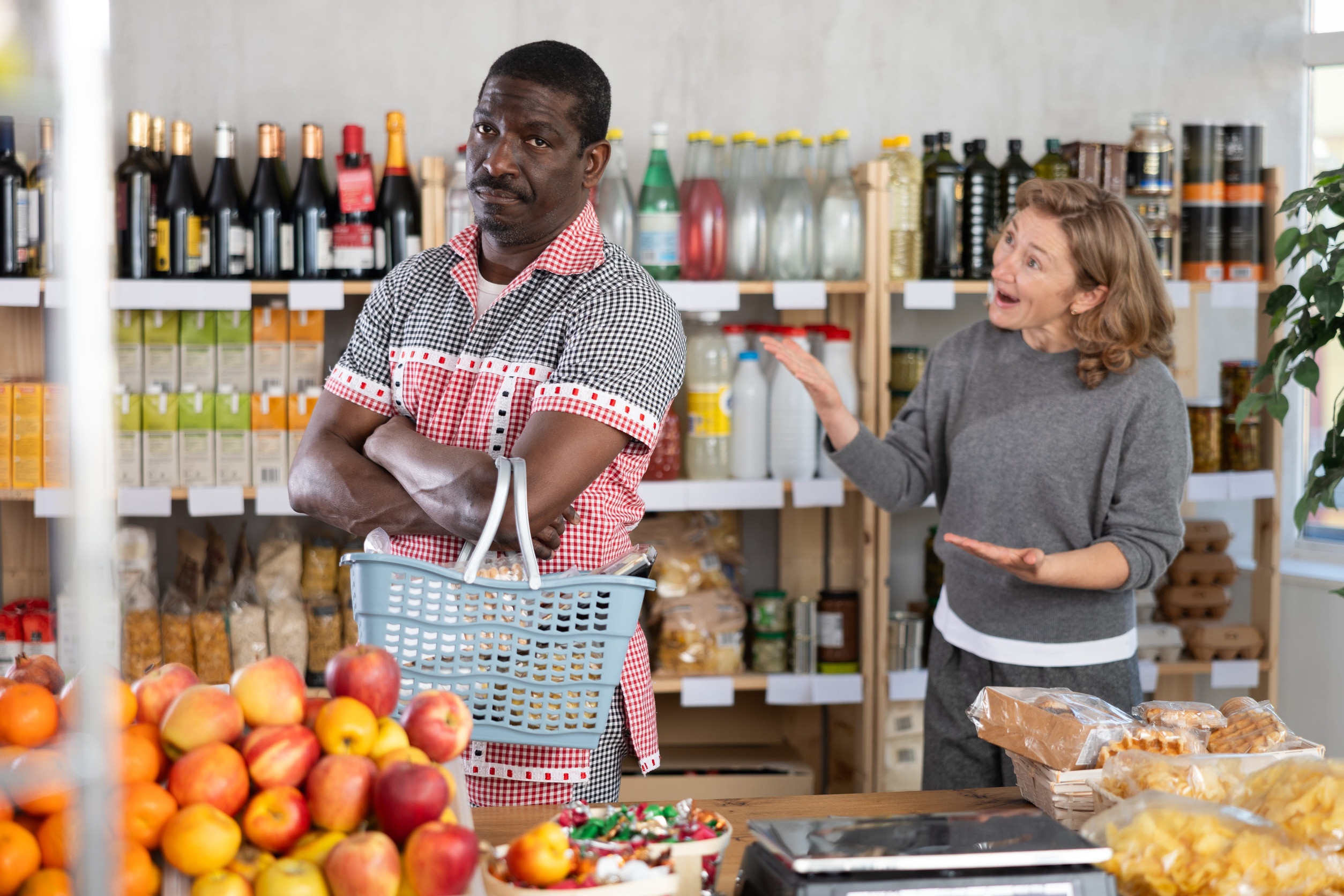 Family quarrel between husband and wife while shopping in grocery supermarket