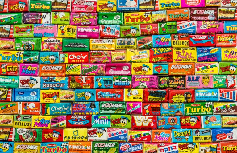 ASHDOD, ISRAEL - SEPTEMBER 27, 2015: Many various colorful chewing or bubble gum from seventies, eighties and nineties, including Robocop, Turbo, Donald Duck, BomBibom, TipiTip, X-Men, Dunkin, OtoMoto