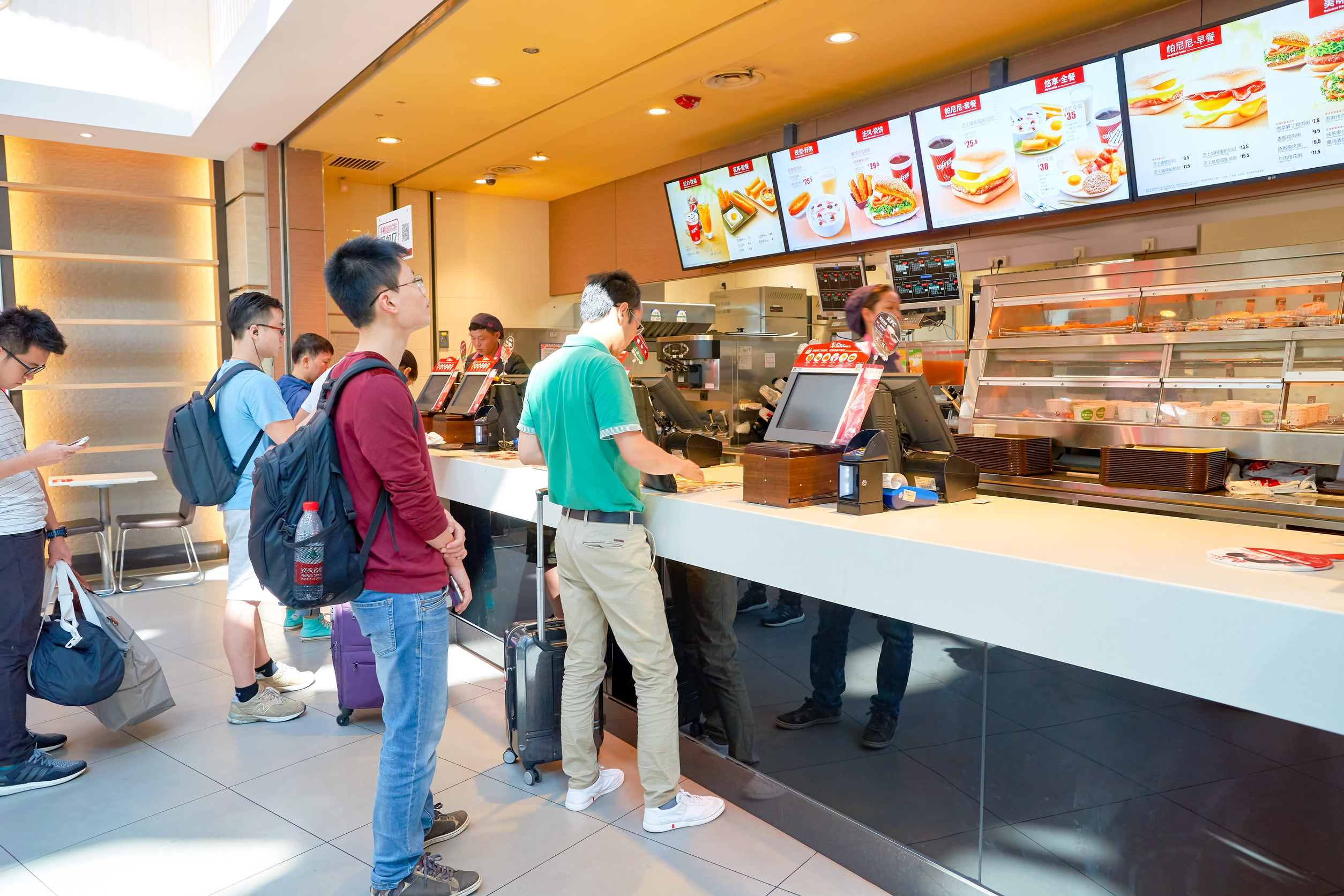 SHENZHEN, CHINA - MAY 11, 2016: KFC in Shenzhen Bao'an International Airport. Kentucky Fried Chicken, or just KFC, is a fast food restaurant chain that specializes in fried chicken.